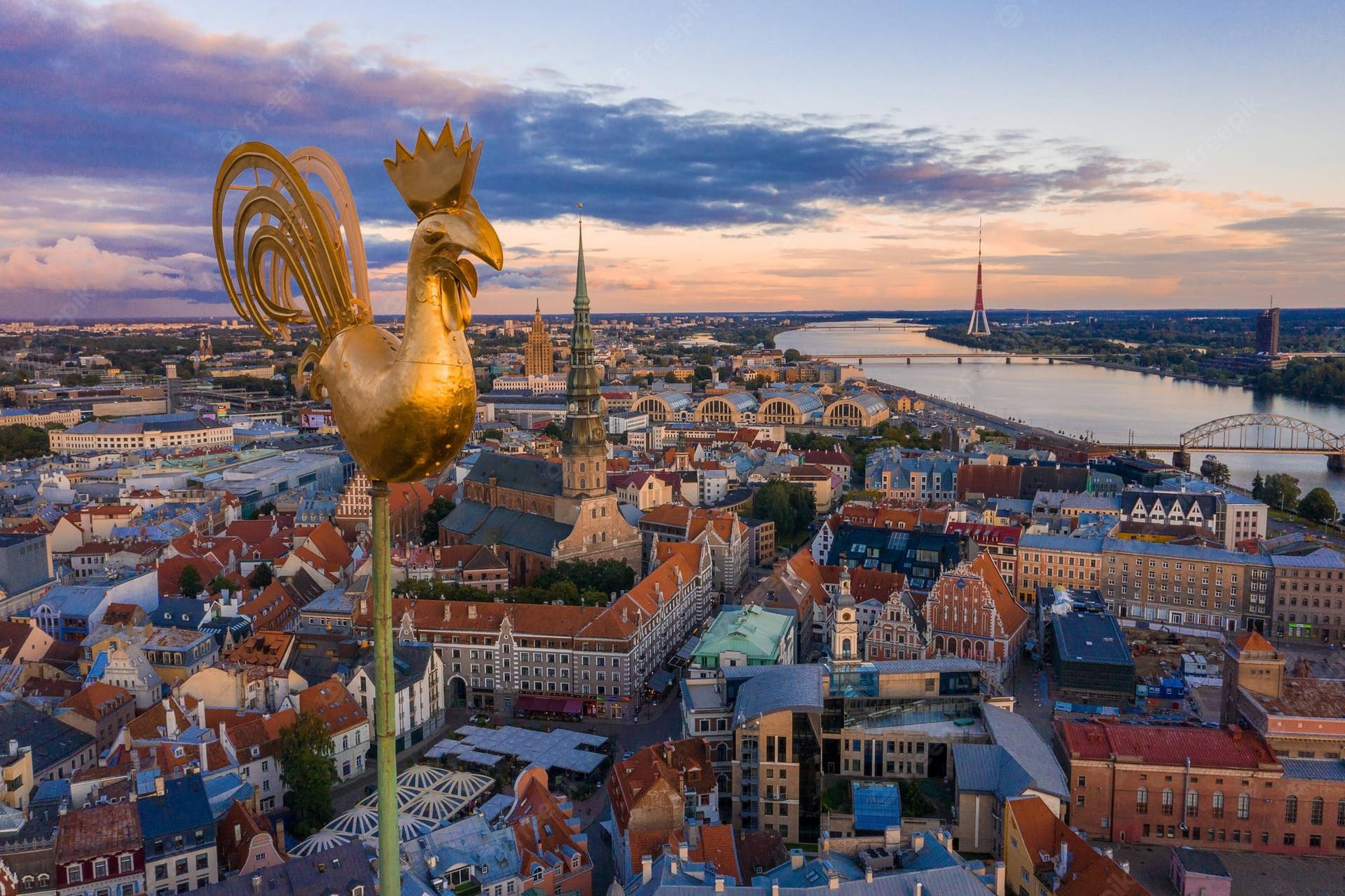 Golden Rooster In The Tower Of Riga Background