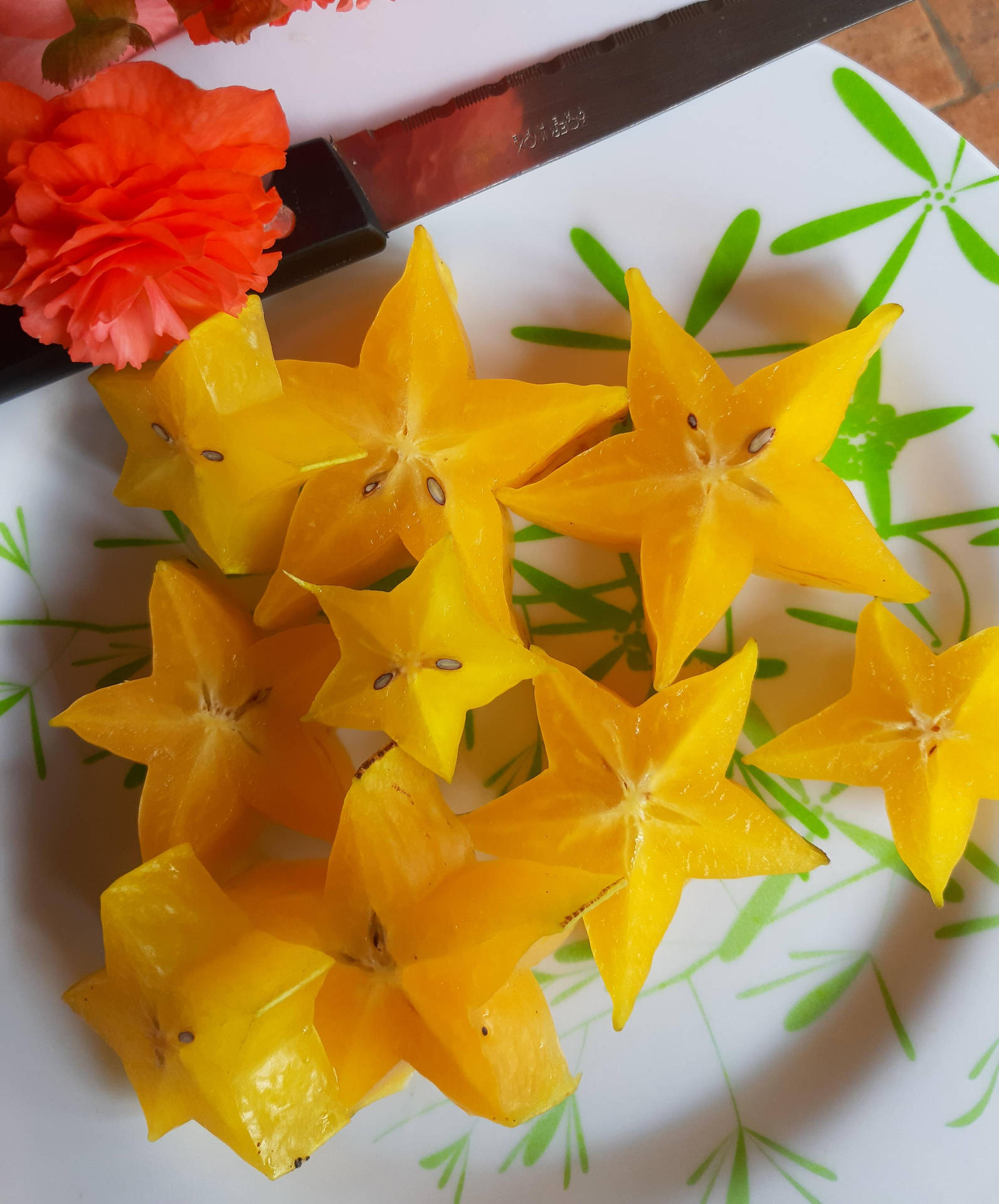 Golden Star Carambola On Plate Background