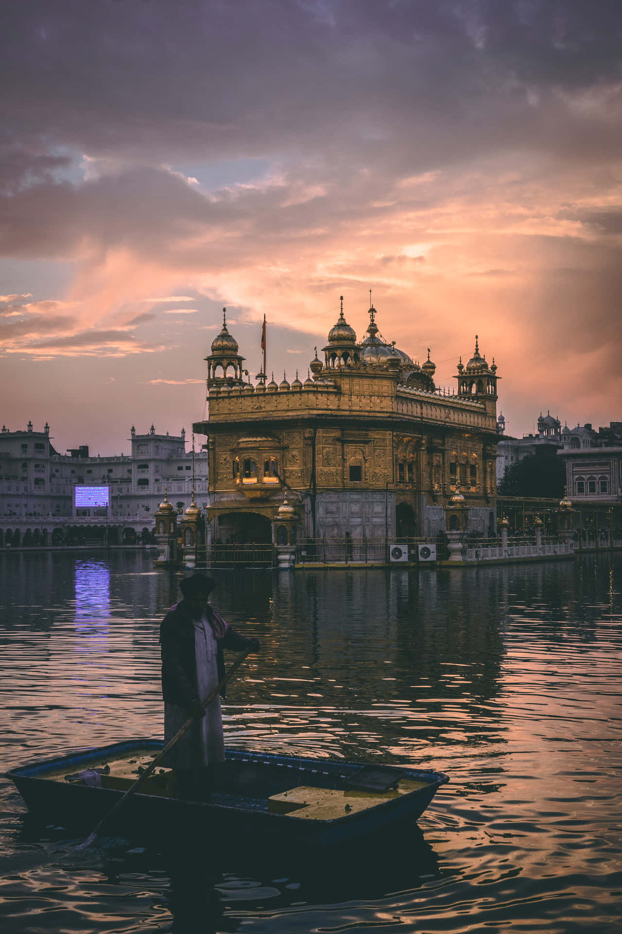 Golden Temple And Boatman Background