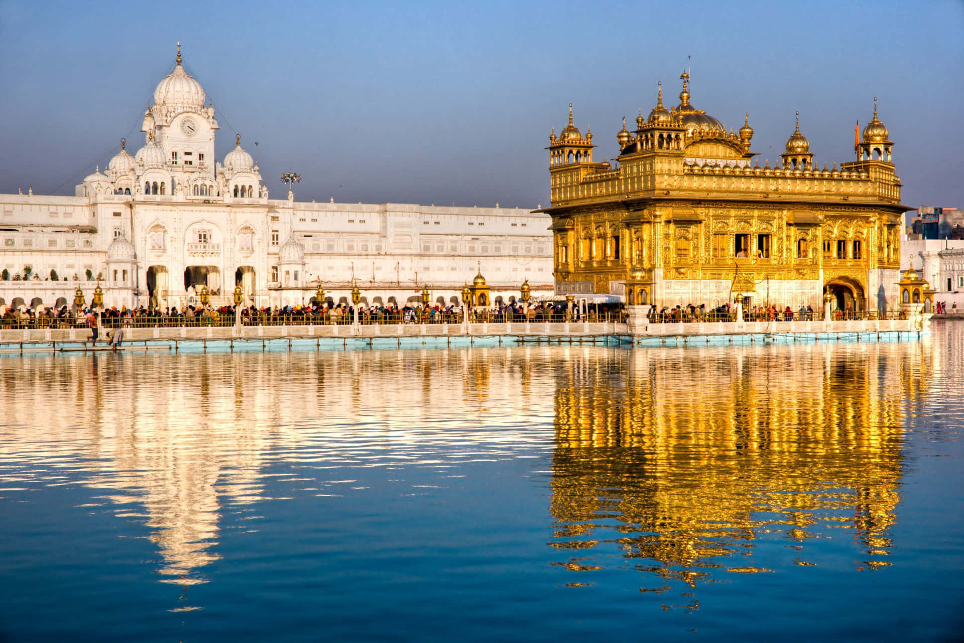 Golden Temple Reflected Off Of Pool Background