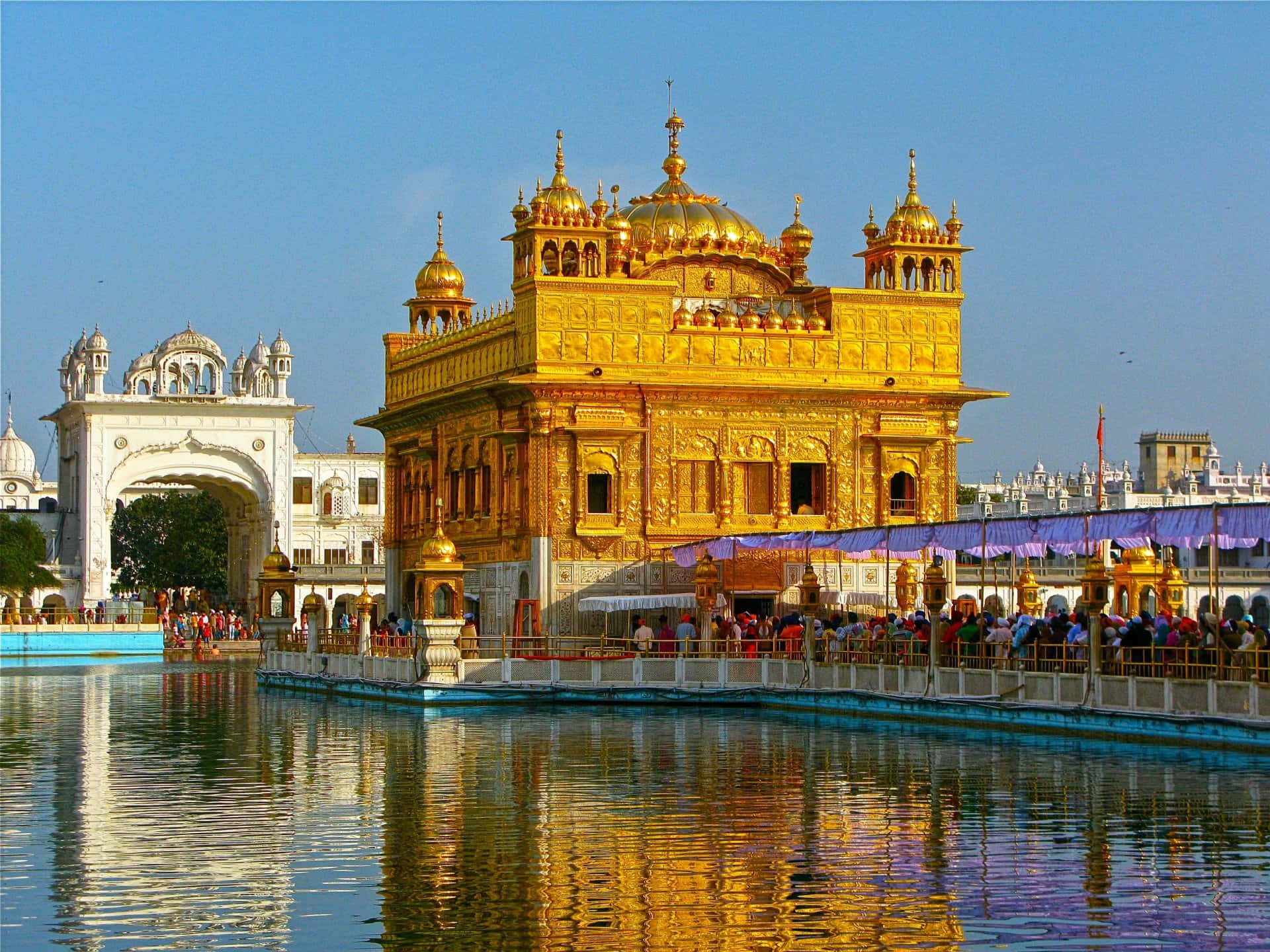 Golden Temple With Festival Banners Background