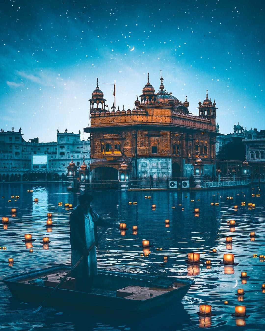 Golden Temple With Floating Candles Background