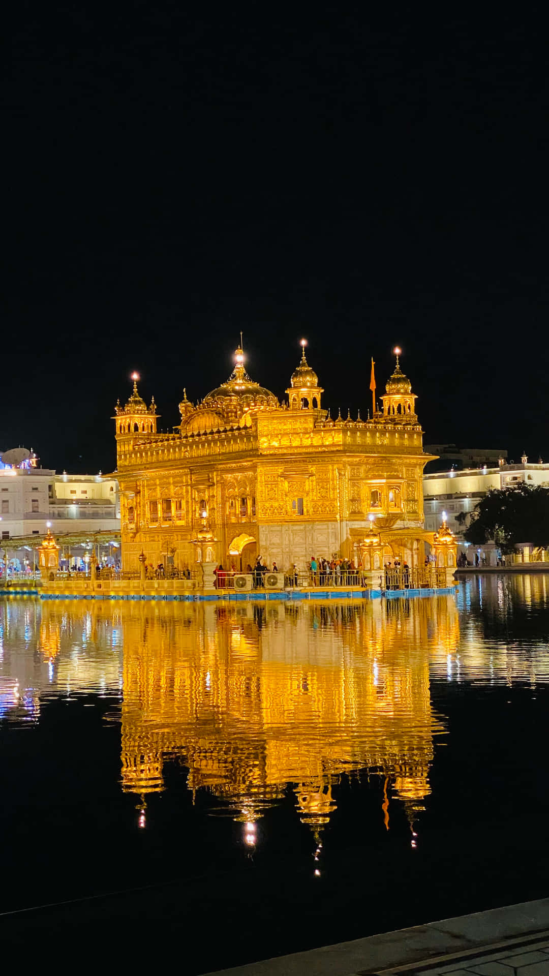 Golden Temple With Lights On Background