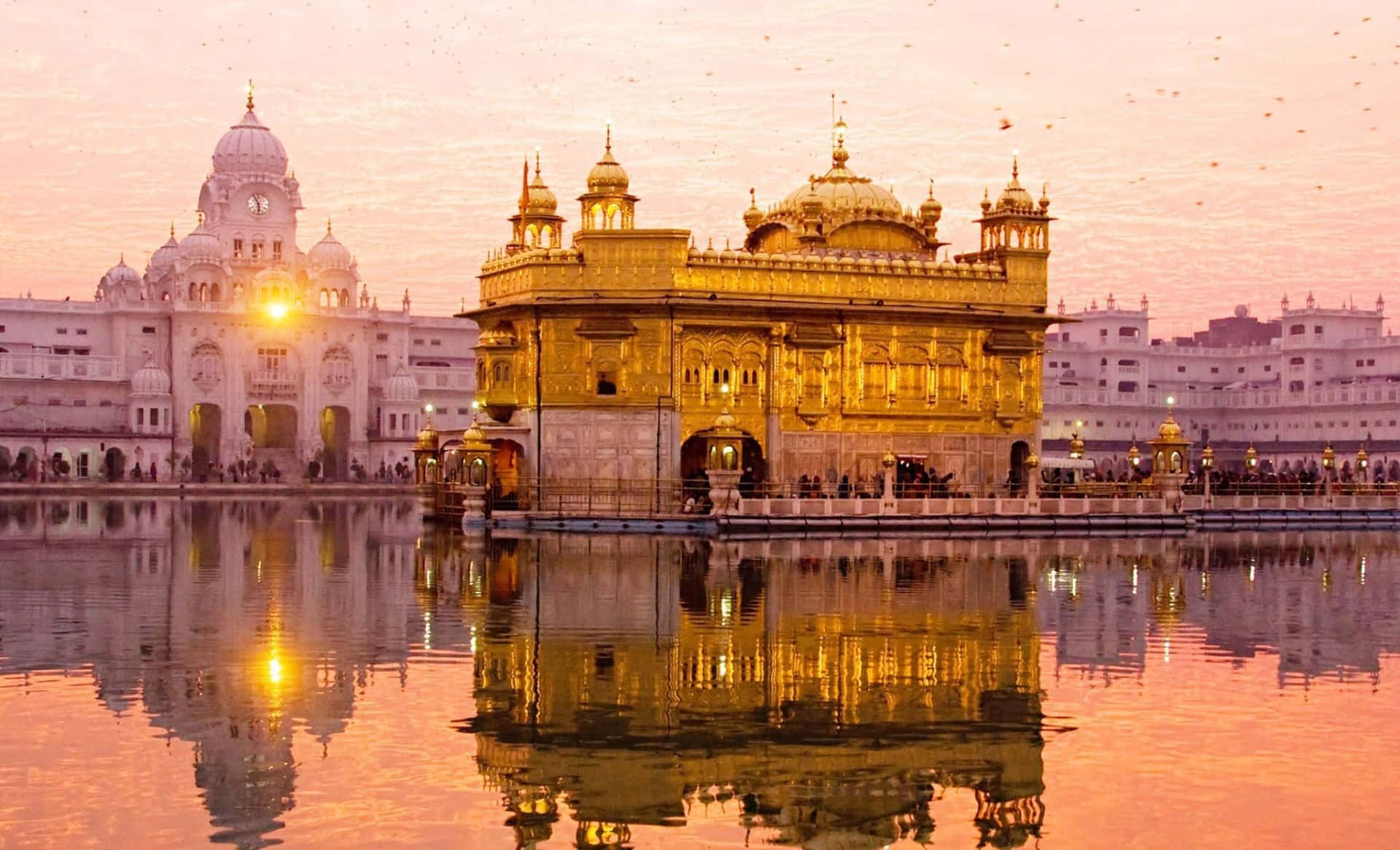 Golden Temple With Reflected Sun Background