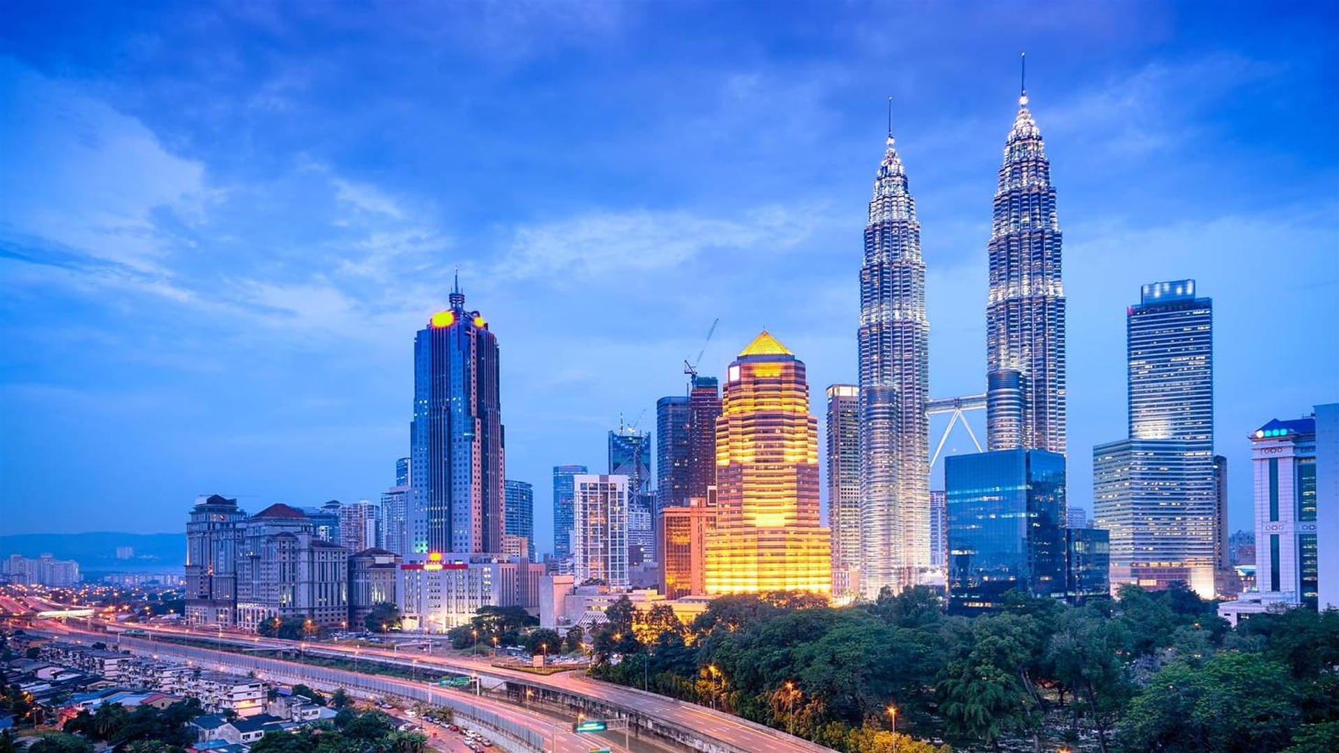 Golden Tower At Kuala Lumpur Background