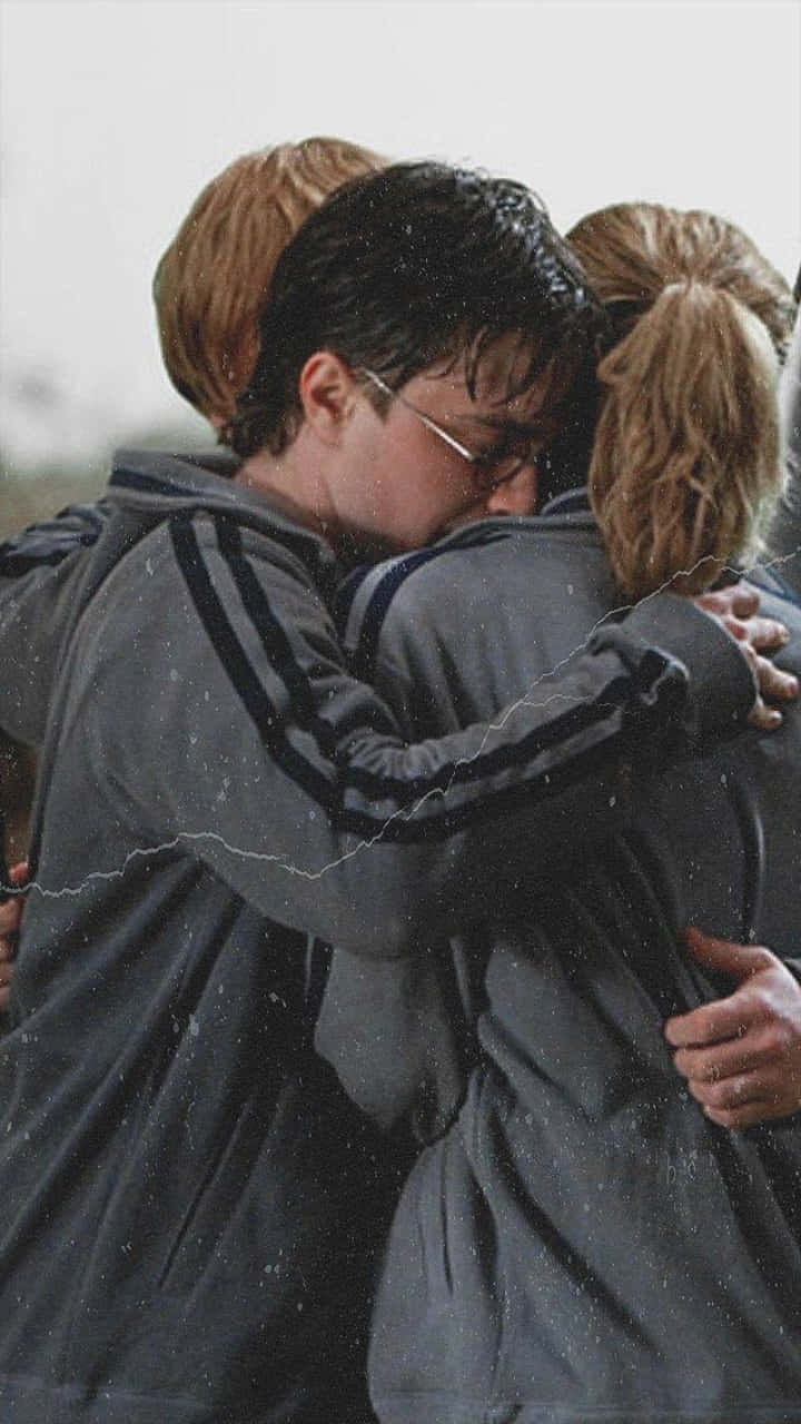 Golden Trio Hugging Phone Background