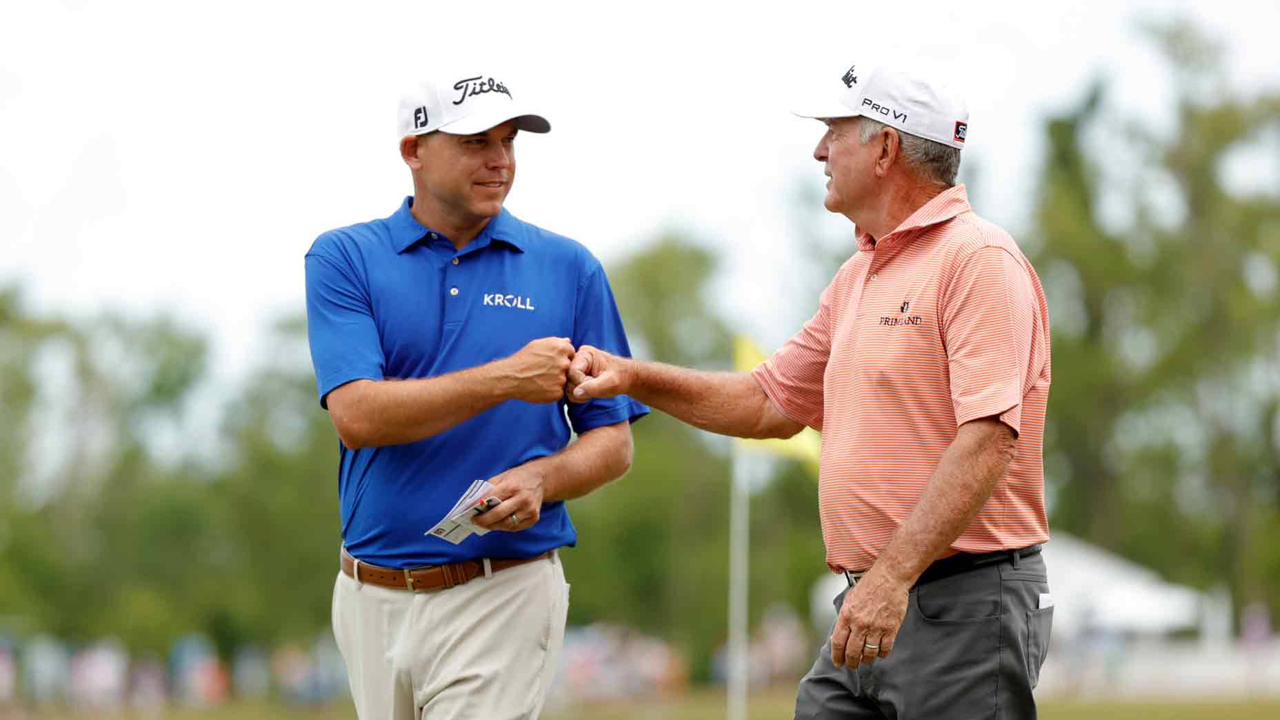 Golf Legends, Jay Haas And Son, Bill, Commemorate Victory With Fist Bump Background