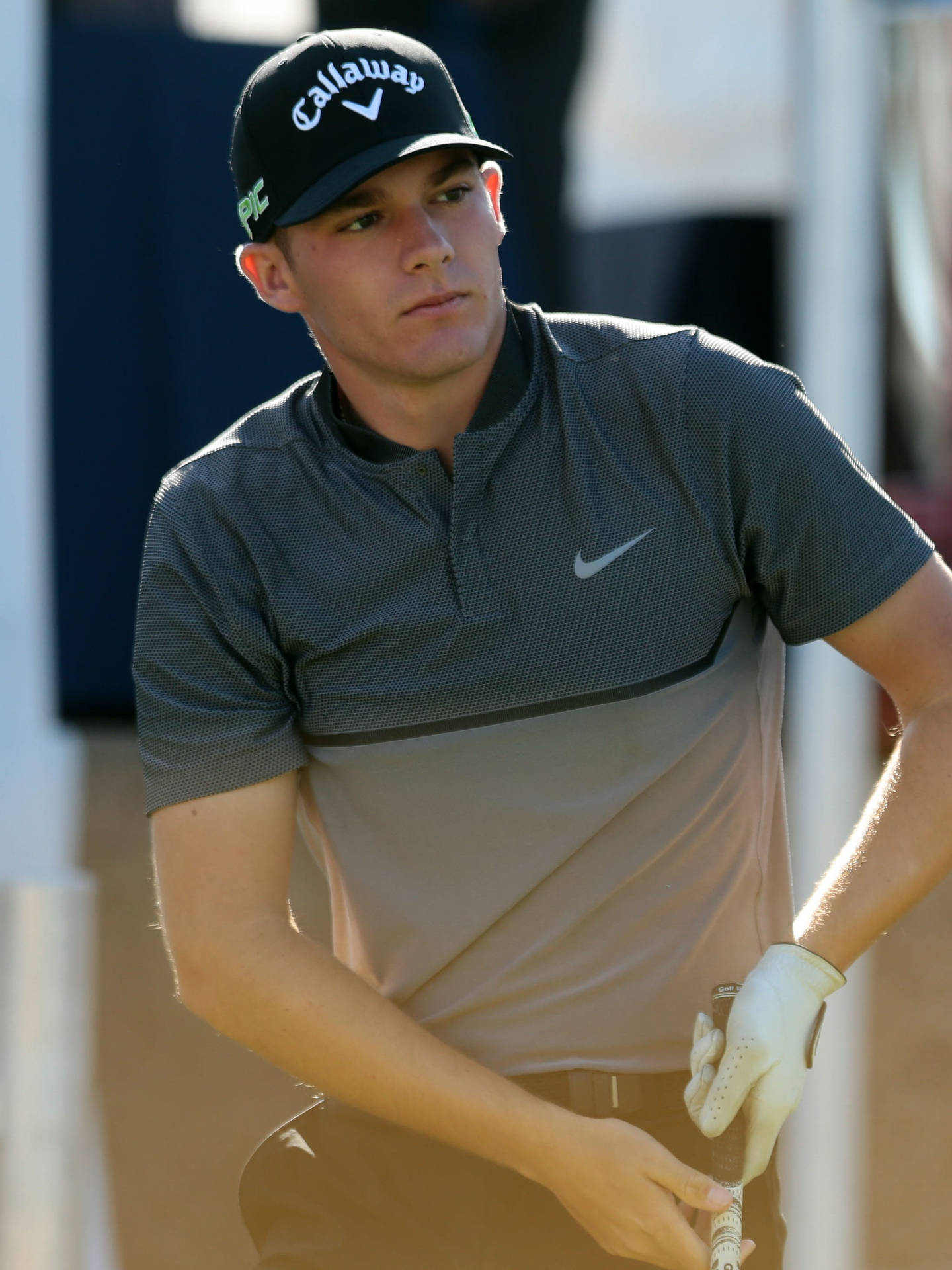 Golfer Aaron Wise In A Nike Shirt Background