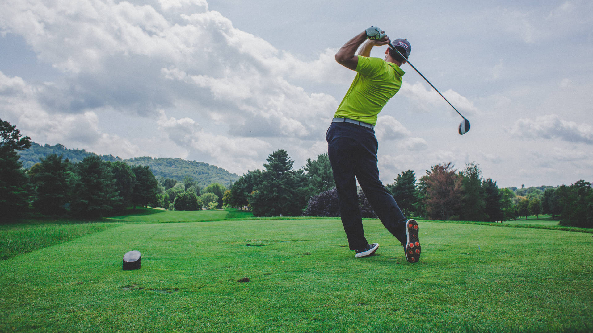 Golfer In Lime Green Golfing Desktop Background