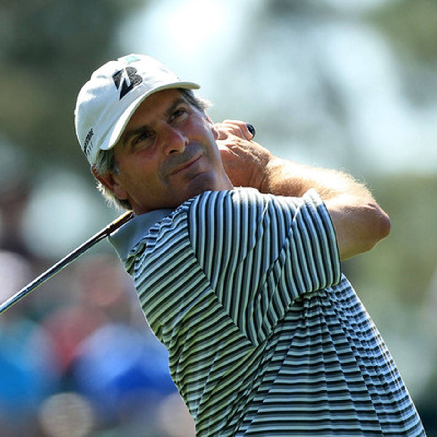 Golfer Nick Price In Stripes Background