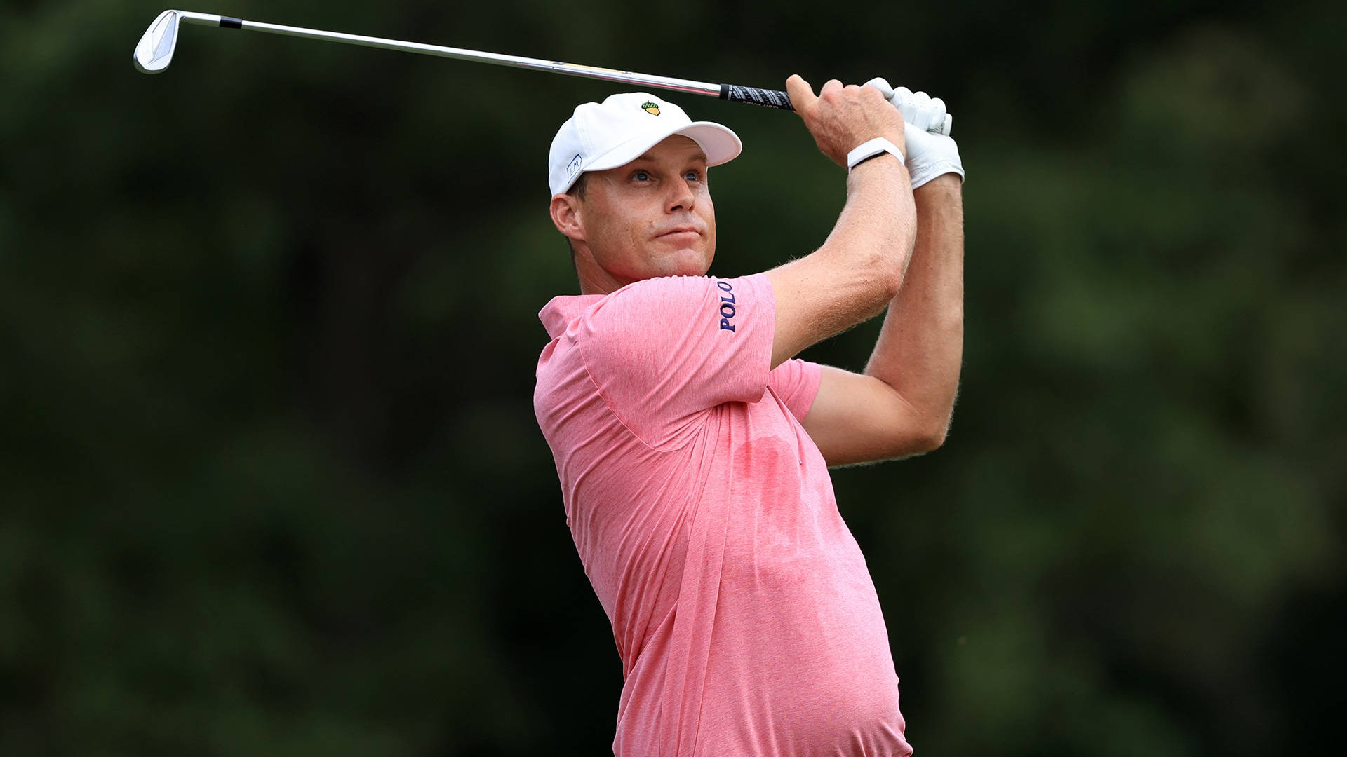 Golfer Nick Watney Mid Swing Background