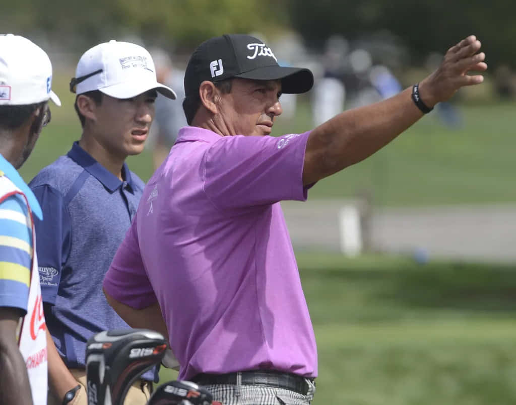 Golfer Tom Pernice Jr Gesturing During Event Background