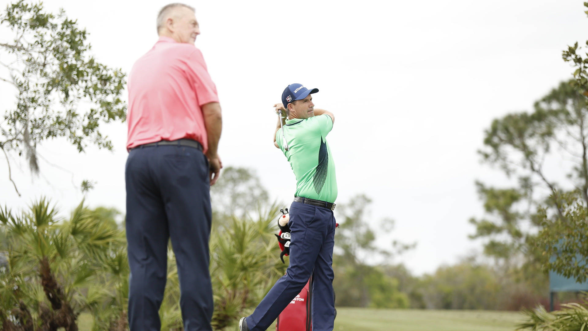 Golfer Watching Padraig Harrington Golf Background