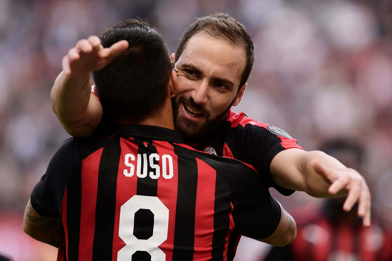 Gonzalo Higuain Hugging Fernandez Suso