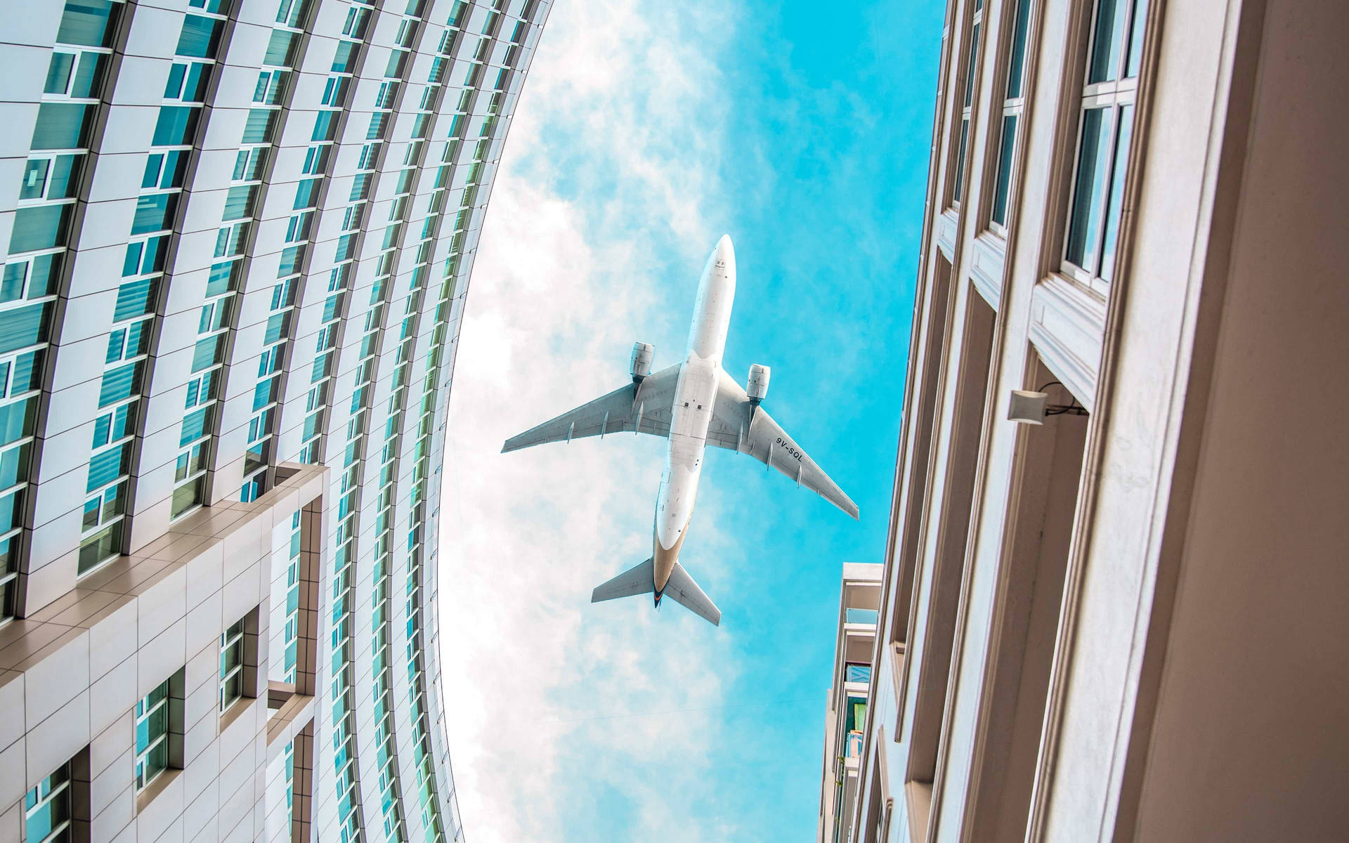 Google Flights Plane Over Building Background