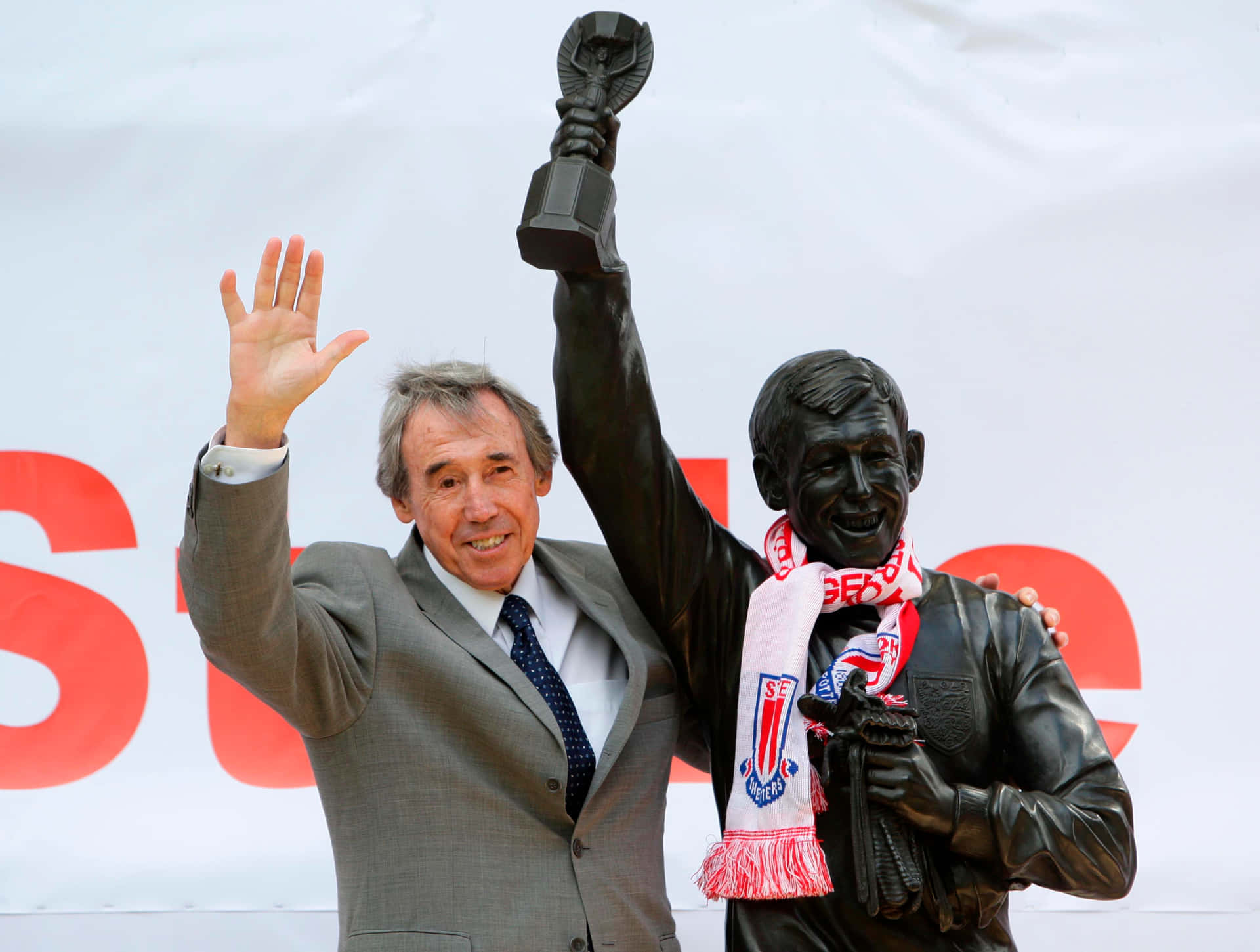 Gordon Banks Next To Black Statue