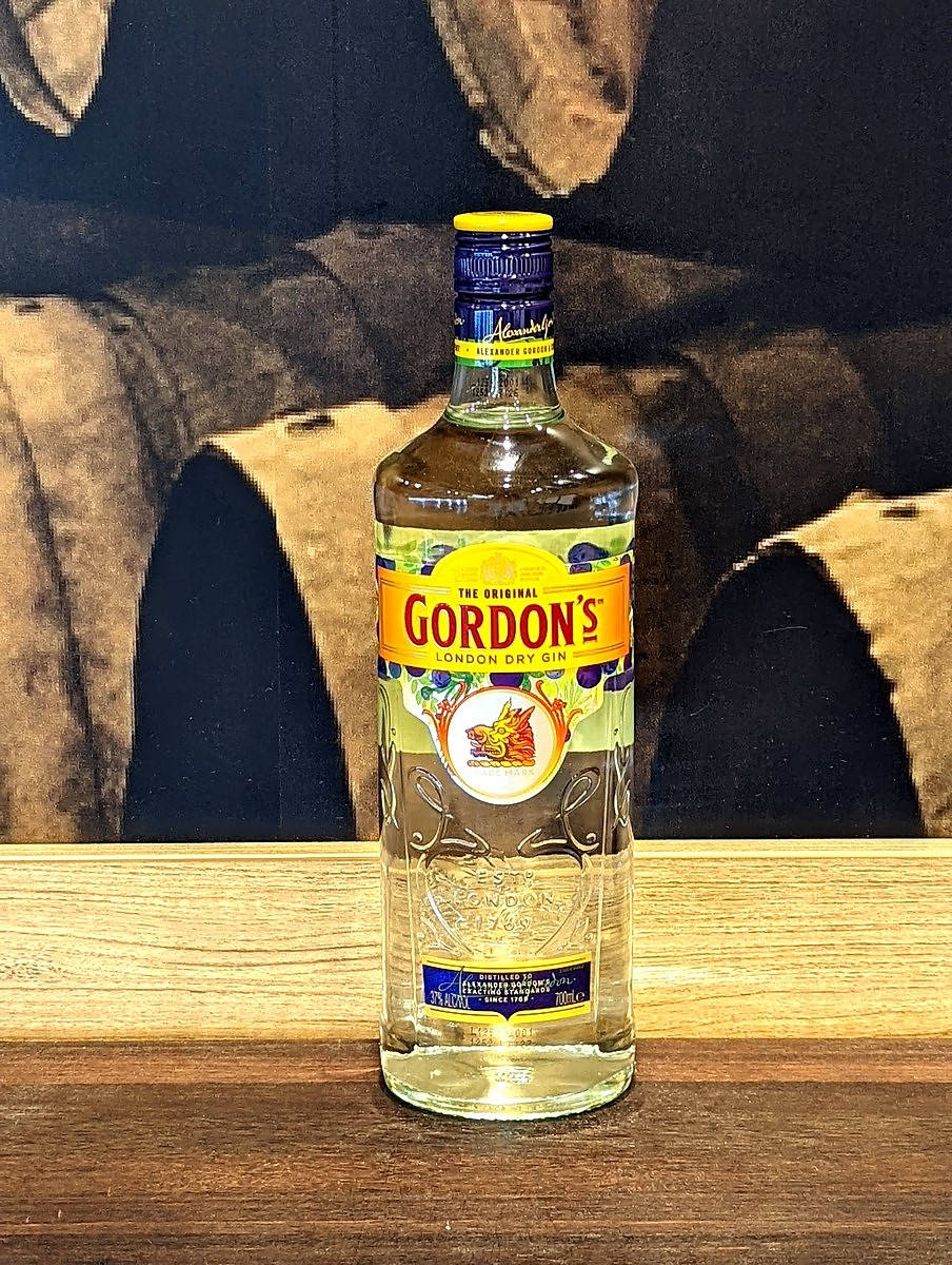 Gordon's London Dry Gin Wooden Bottle Background