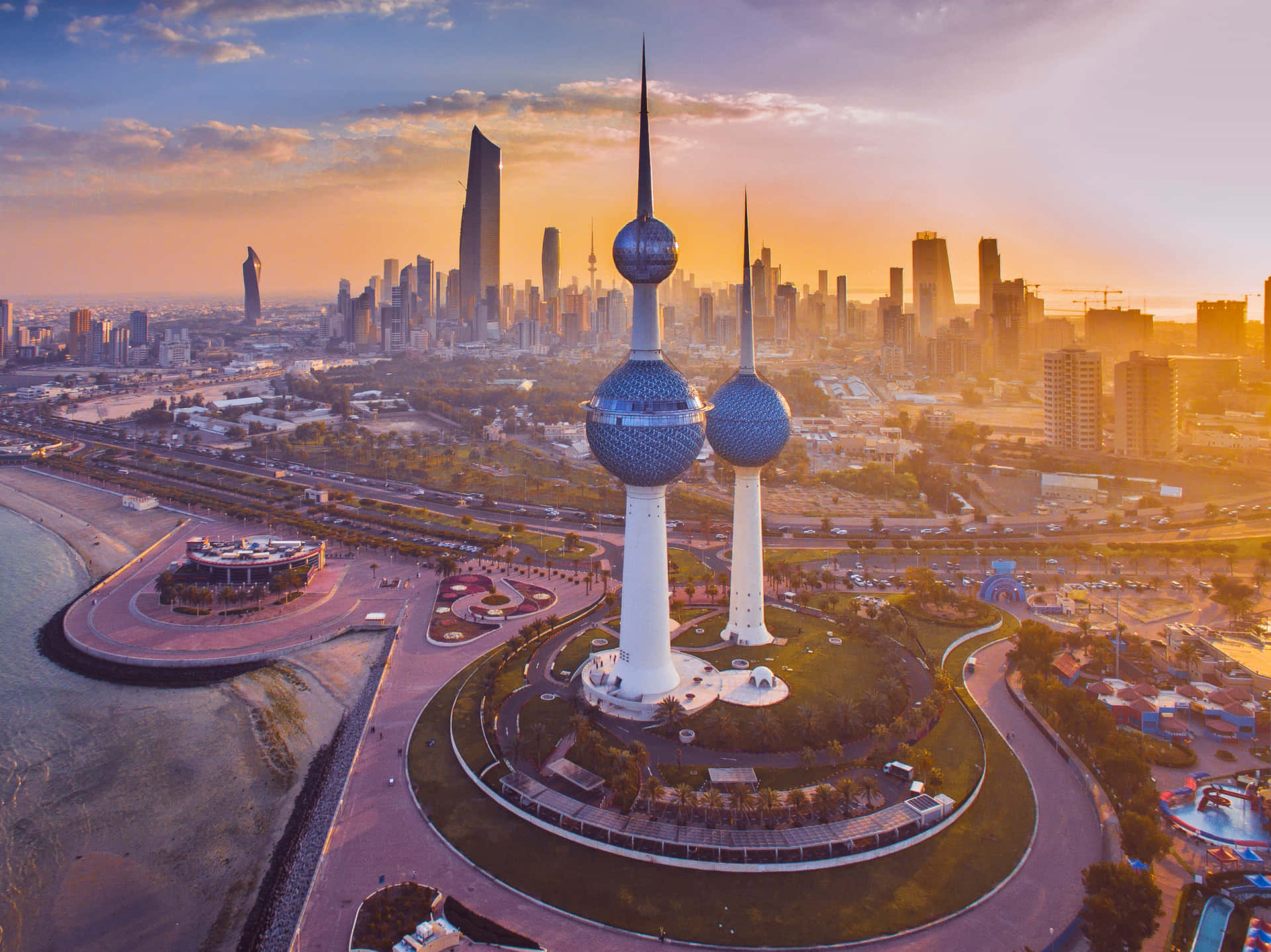 Gorgeous Sunset Over Kuwait Towers Background