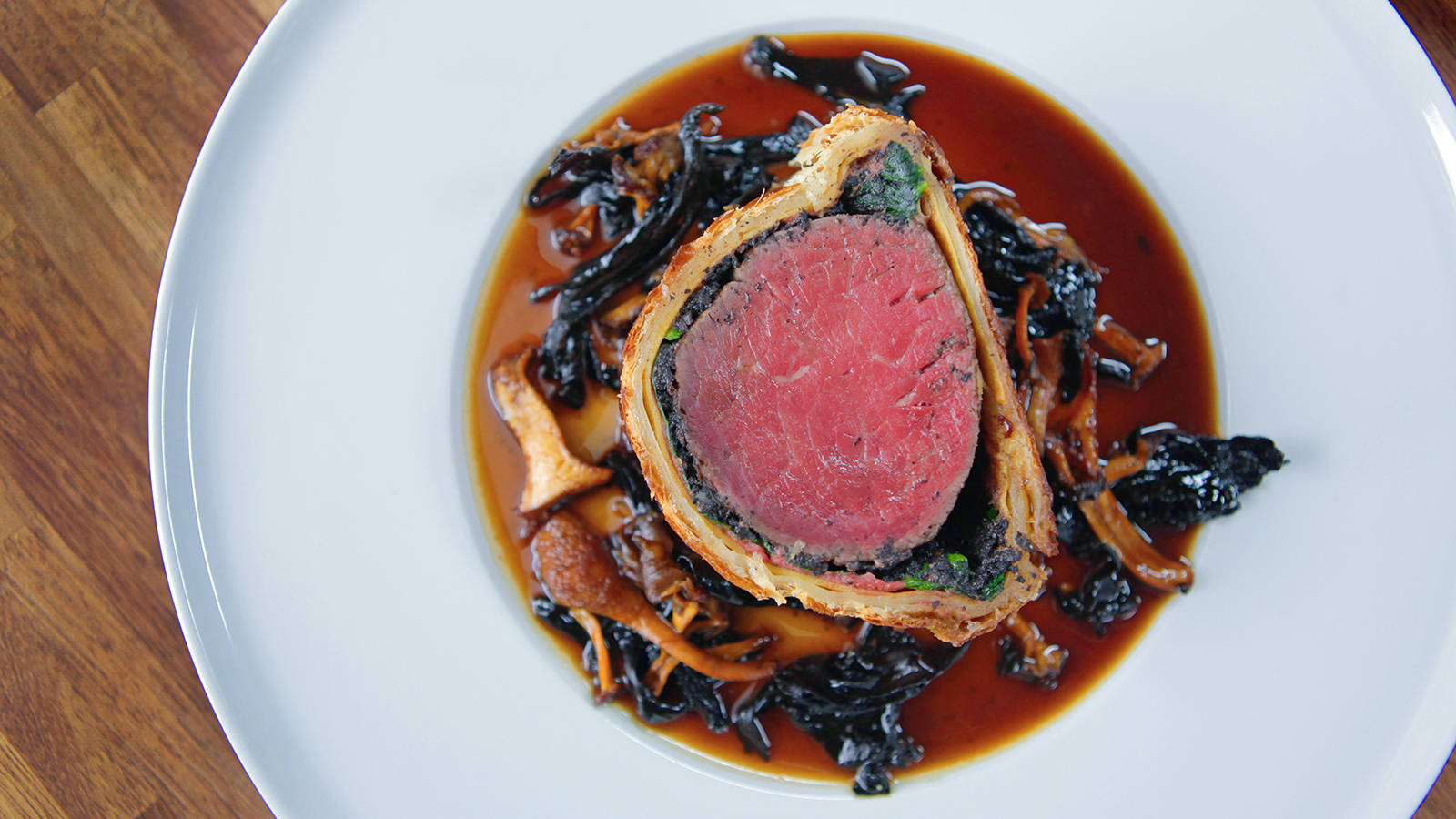 Gourmet Beef Wellington Topped With Wild Mushrooms