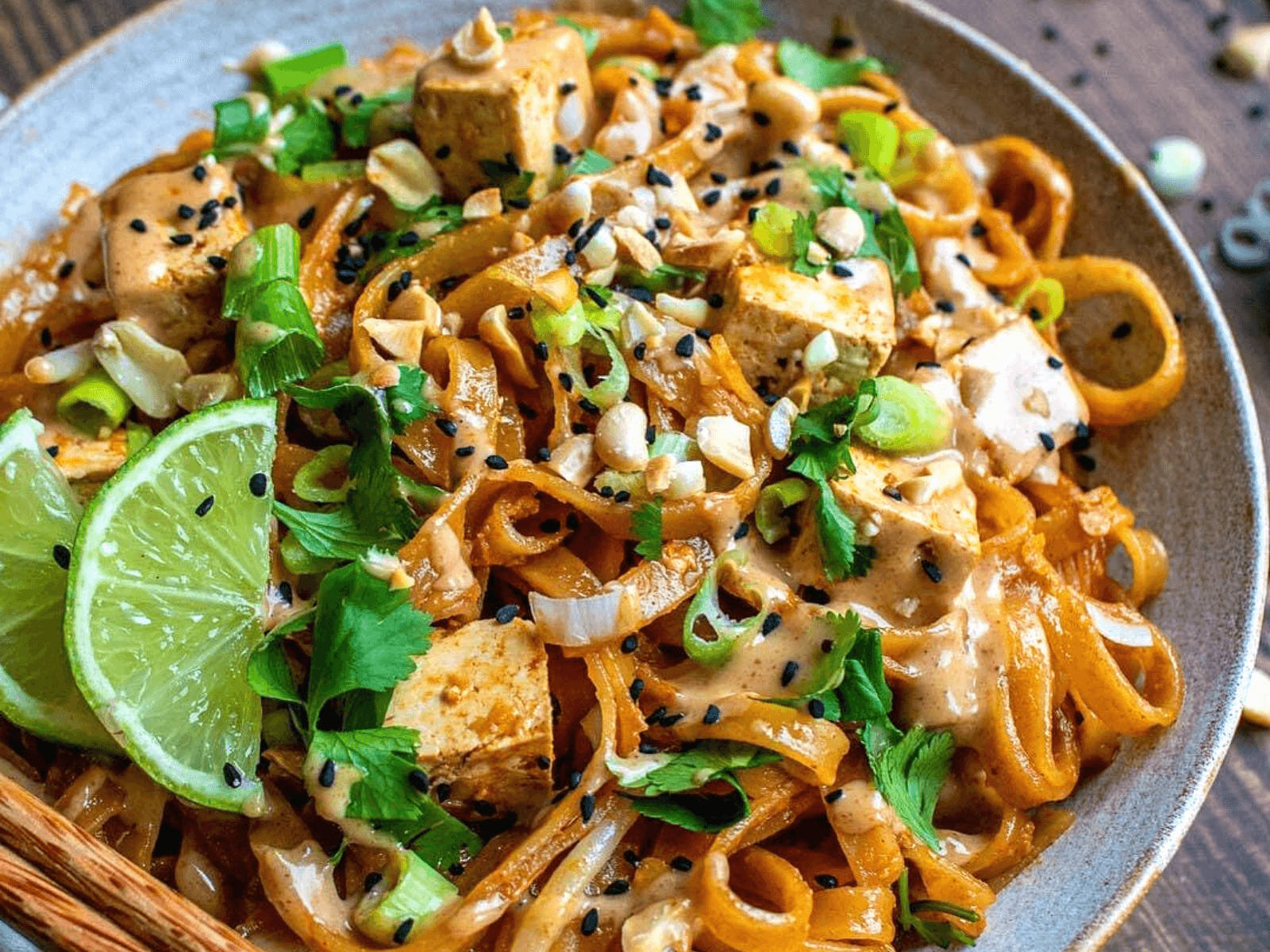 Gourmet Pad Thai Dish On A Plate Background