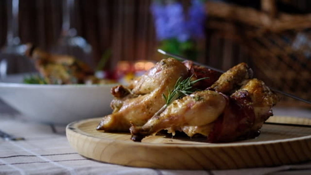 Gourmet Roasted Quail On Wooden Board Background