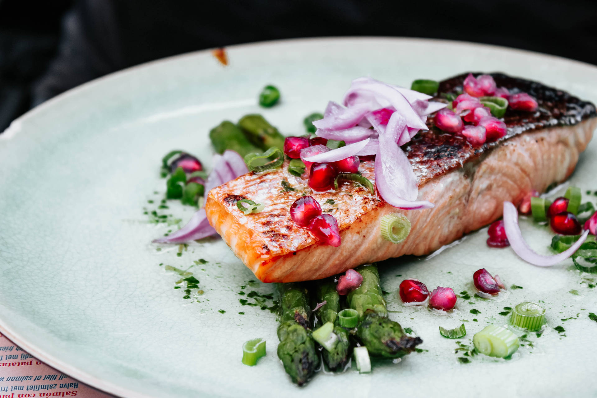 Gourmet-style Salmon Fillet Garnished With Fresh Herbs Background