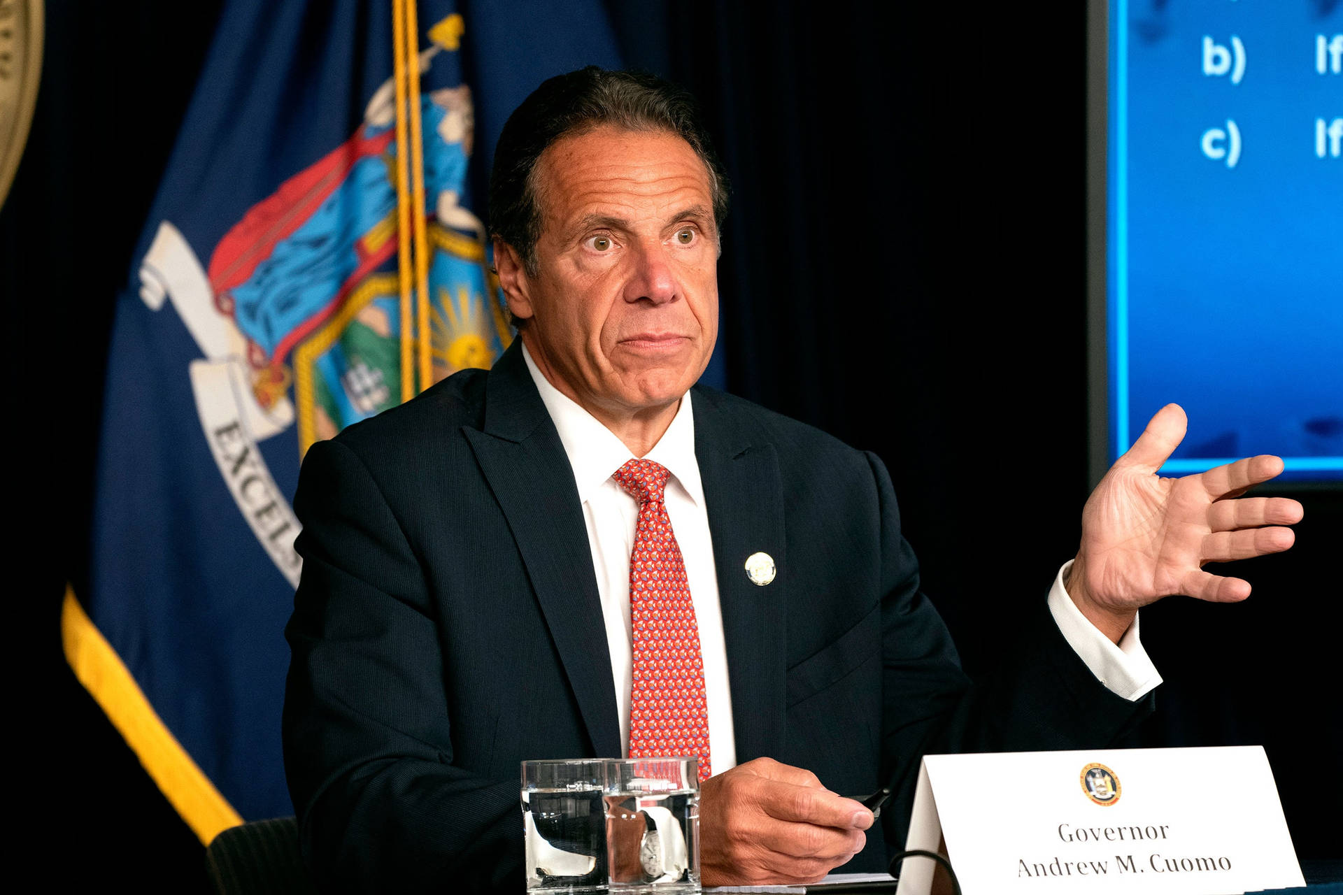 Governor Andrew Cuomo In A Press Conference Background