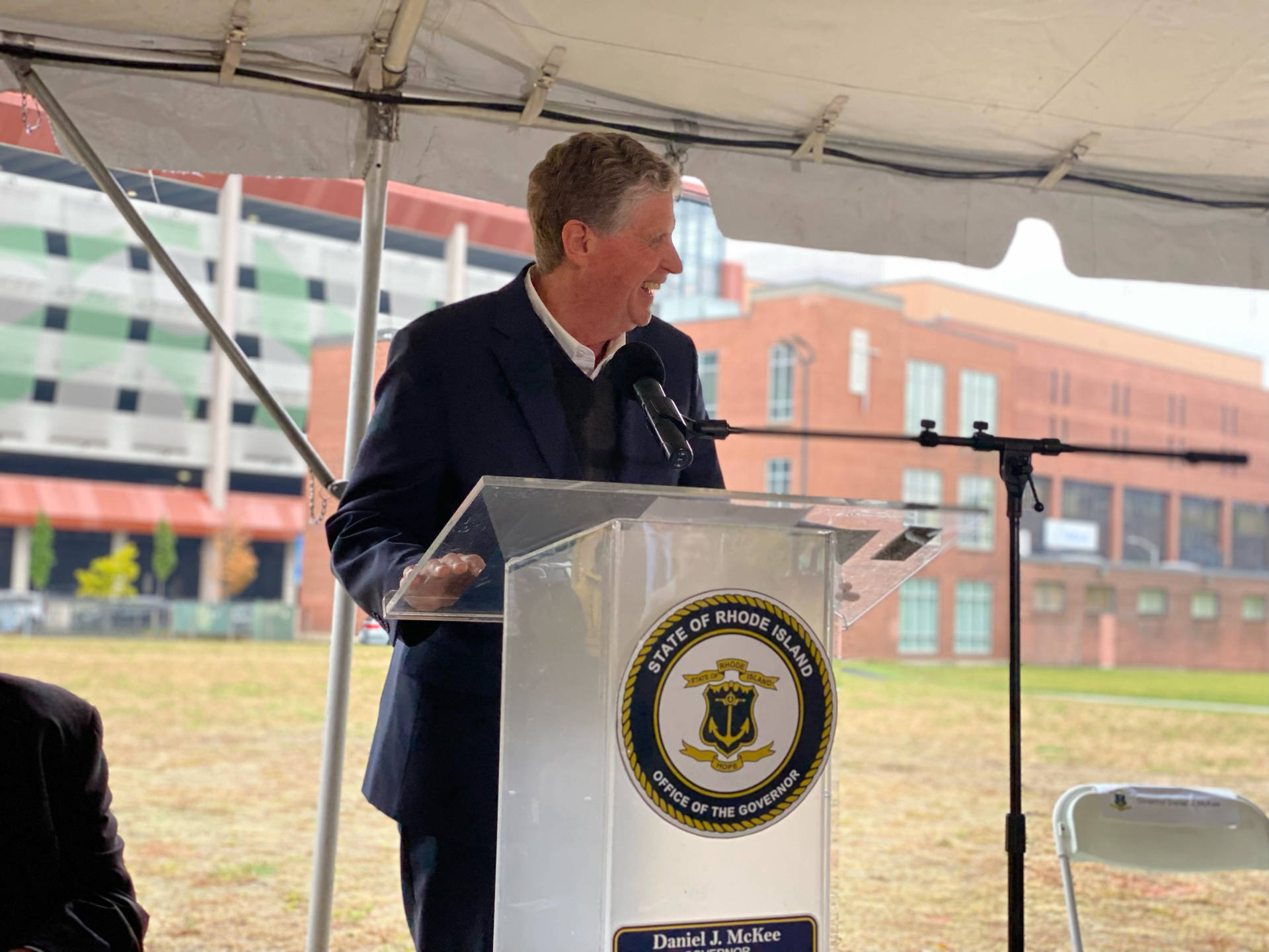 Governor Dan Mckee At Brown University Background