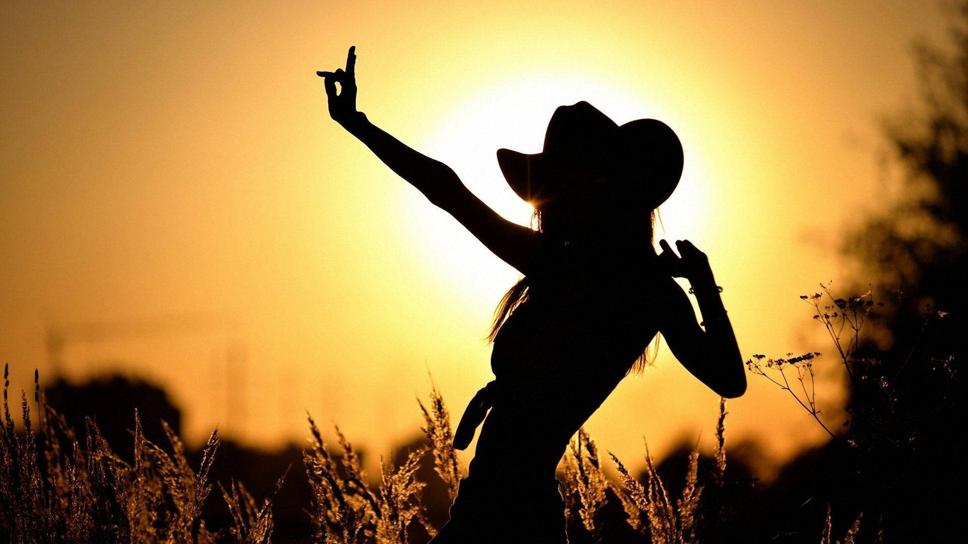 Graceful Dancing Cowgirl Background