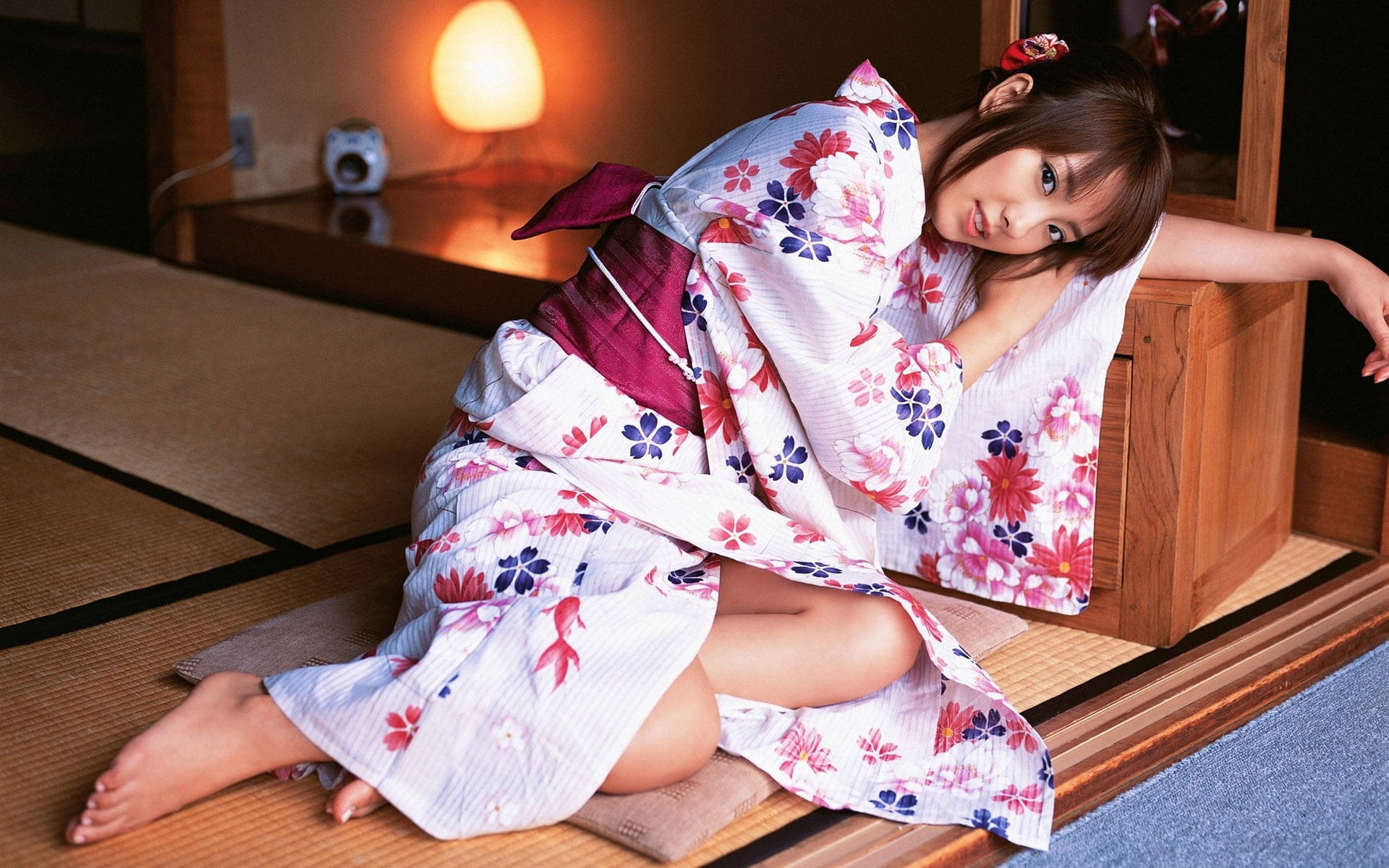 Graceful Japanese Girl Dressed In Traditional Kimono Background