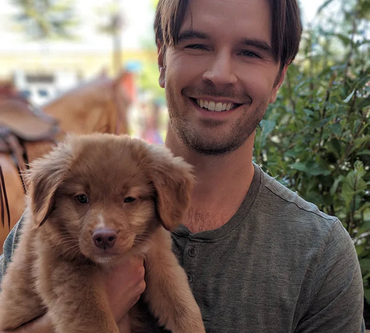 Graham Wardle With Puppy Background