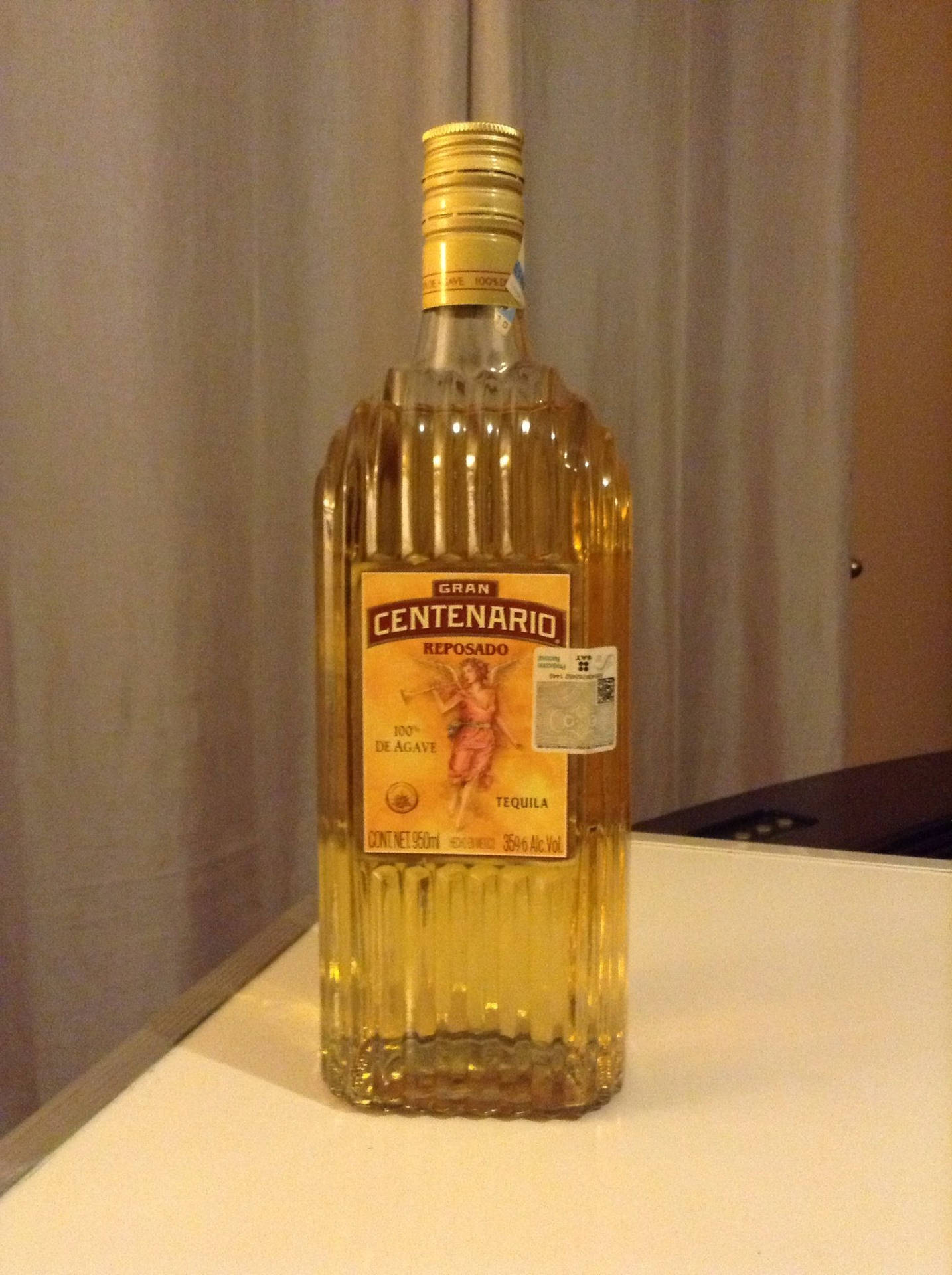 Gran Centenario Tequila Reposado Inside A Room Background