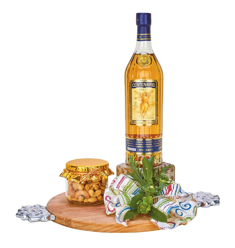 Gran Centenario Tequila With Glass Jar Of Nuts Background