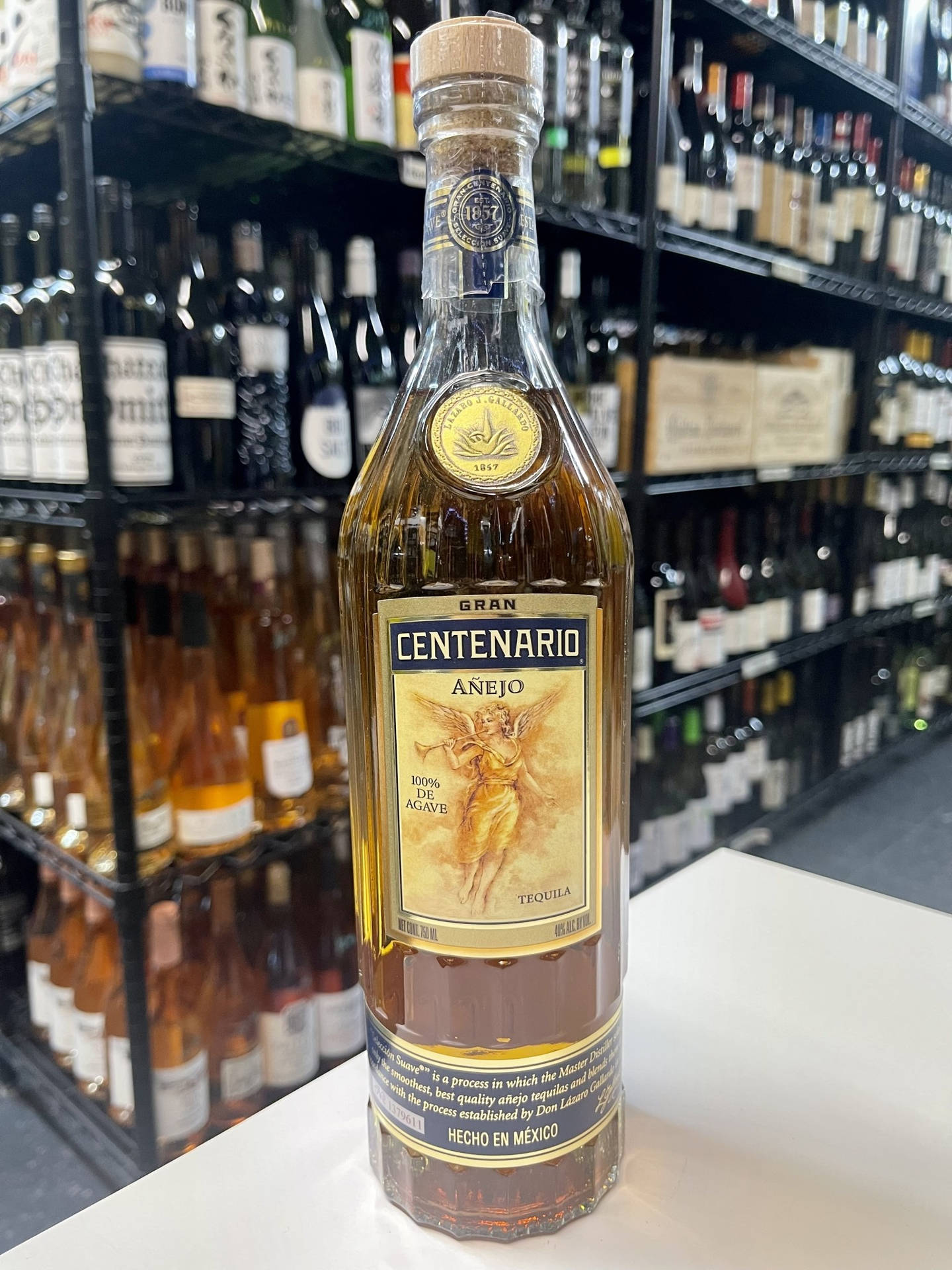 Grand Centenario Tequila Añejo At Grocery Store Background