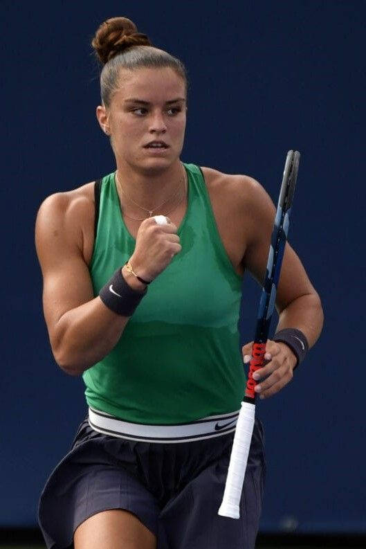 Grand Slam Talent Maria Sakkari Showcasing Her Professional Tennis Skills At The Hard Court. Background