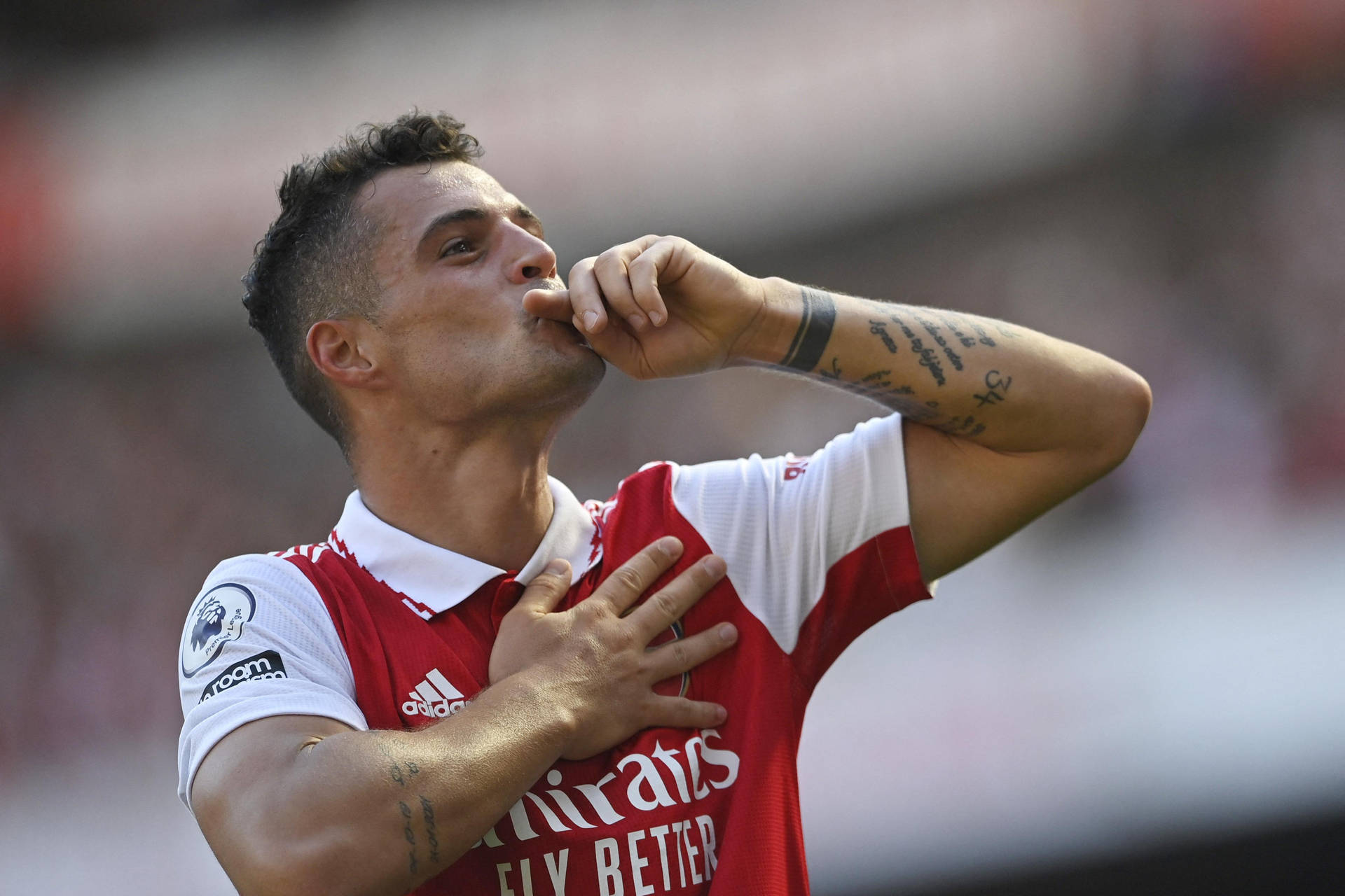 Granit Xhaka Flying Kiss Background