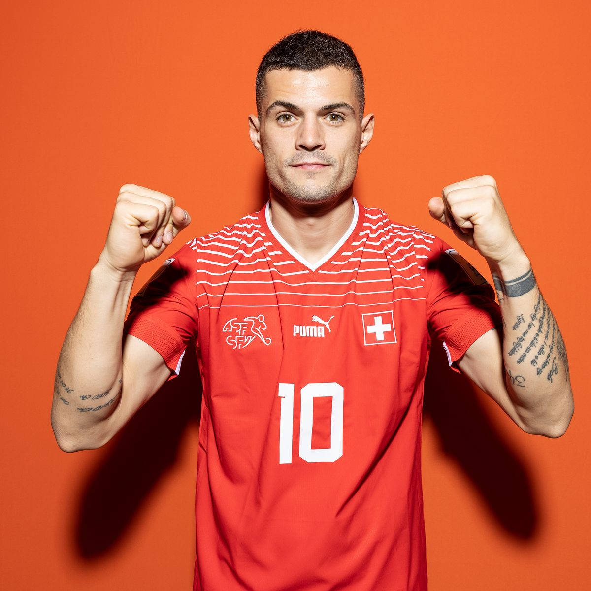 Granit Xhaka Orange Background Background