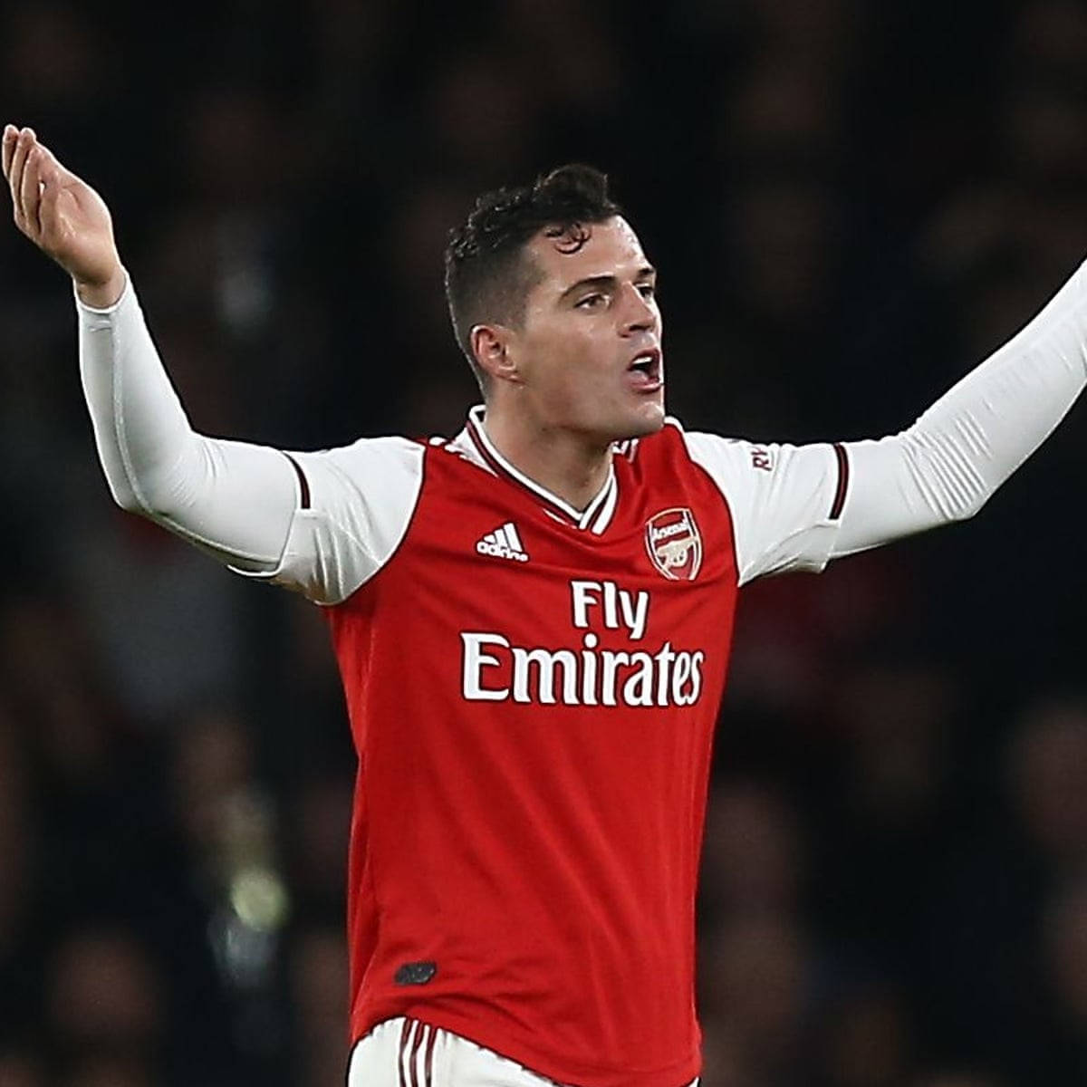 Granit Xhaka Raises Arms Background