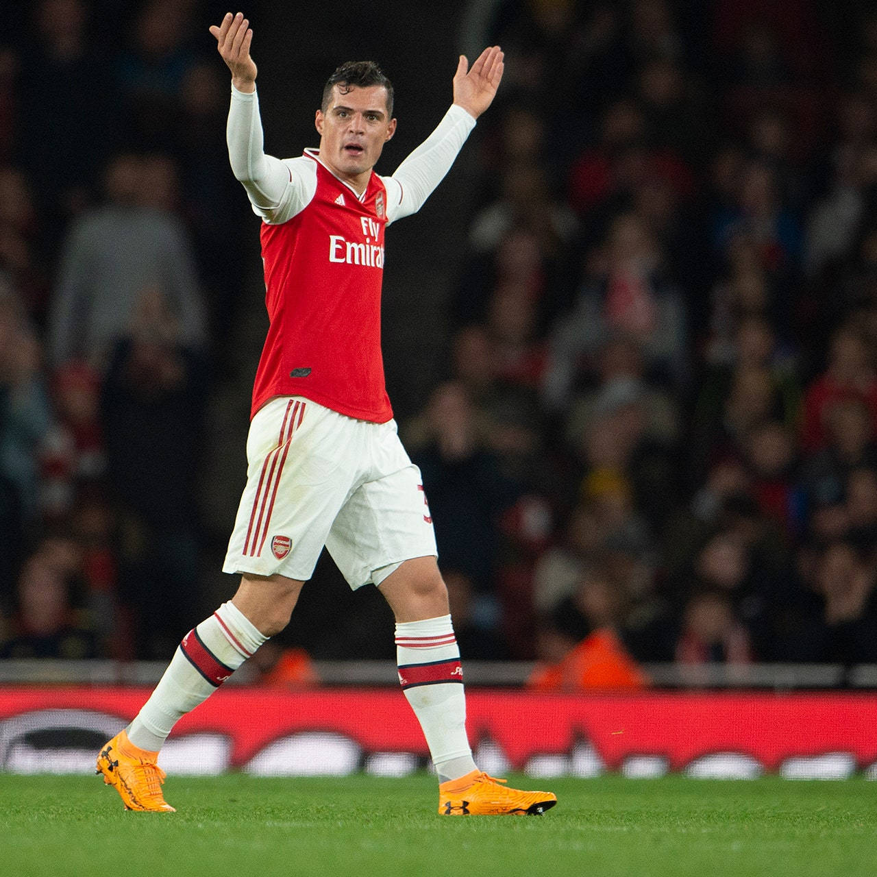 Granit Xhaka Raises Arms Background