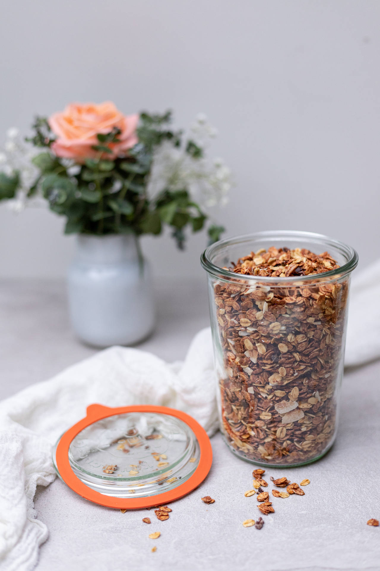 Granola And Pink Rose Flower Background