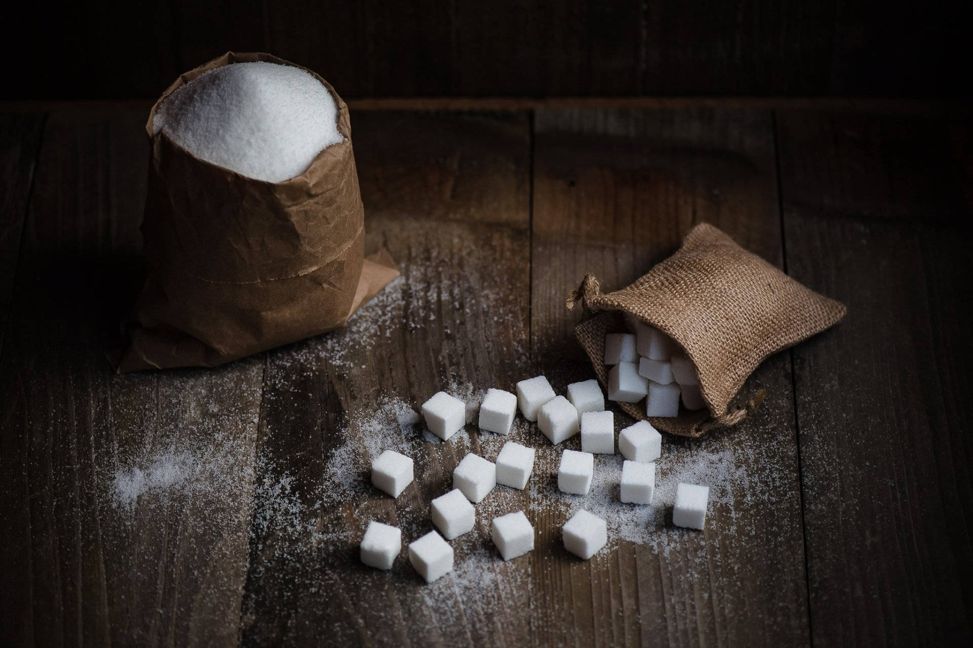 Granulated Sugar And Cubes Background