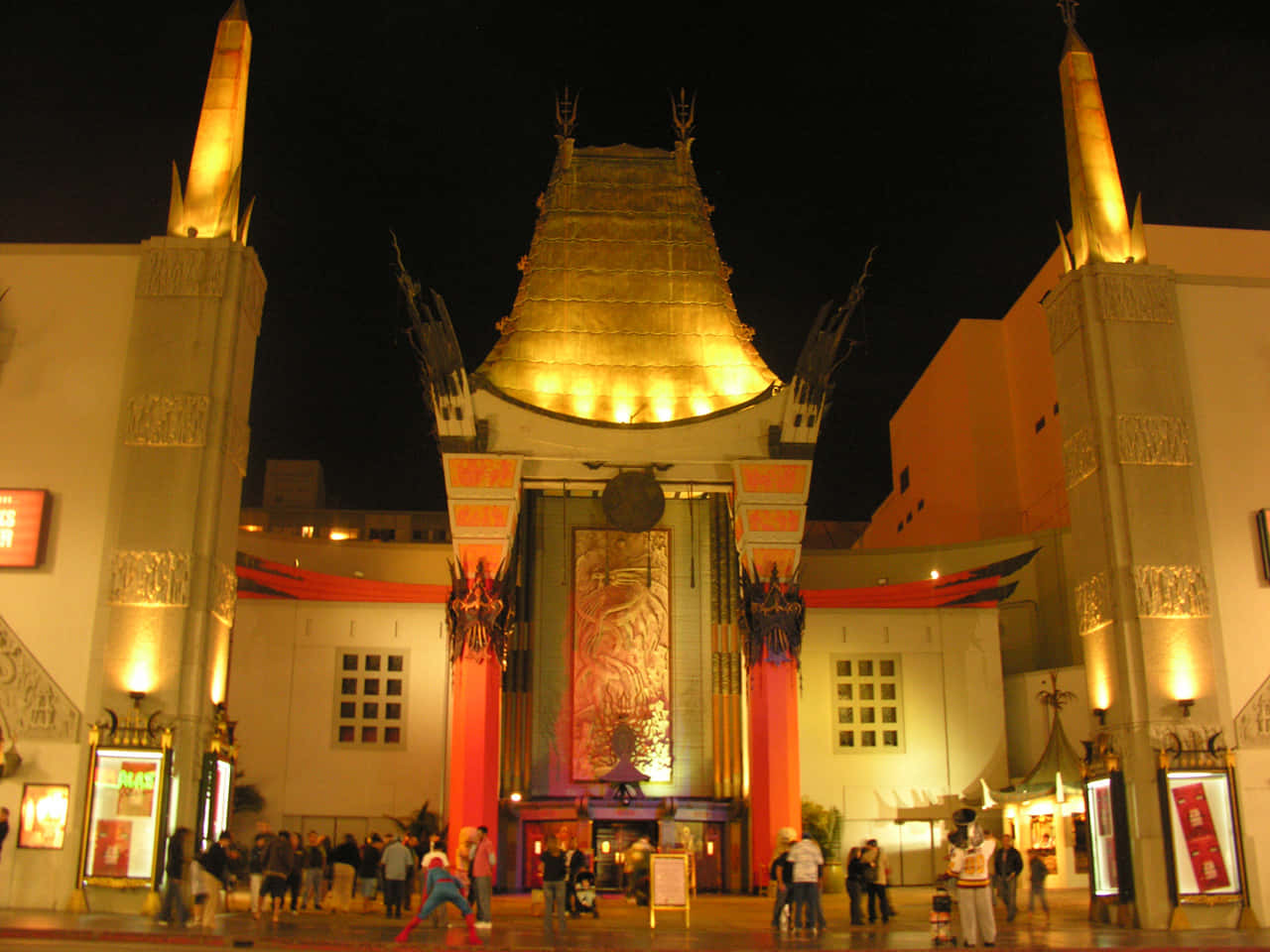 Graumans Chinese Theatre With Golden Lights Background