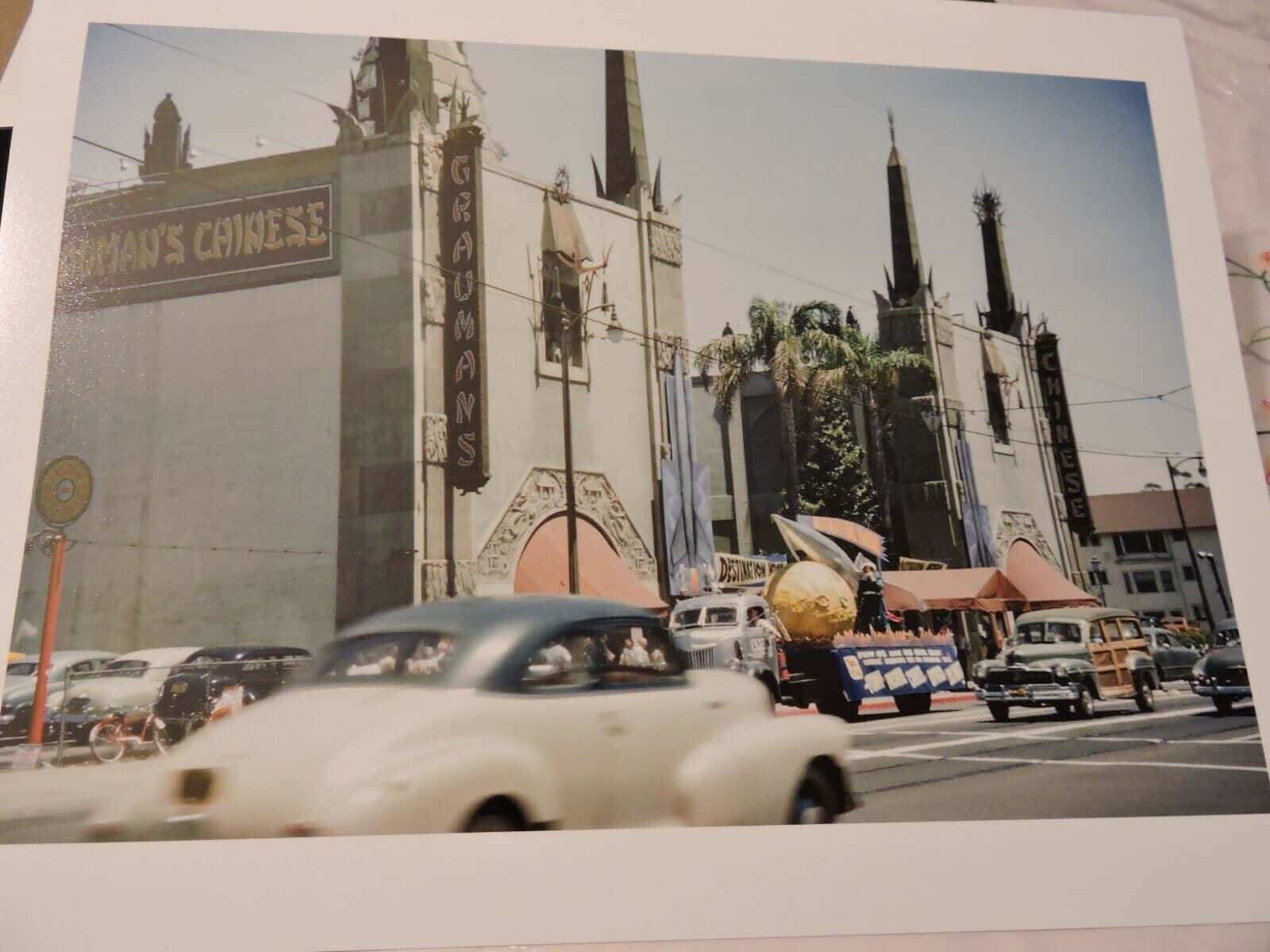 Graumans Chinese Theatre With Retro Cars Background