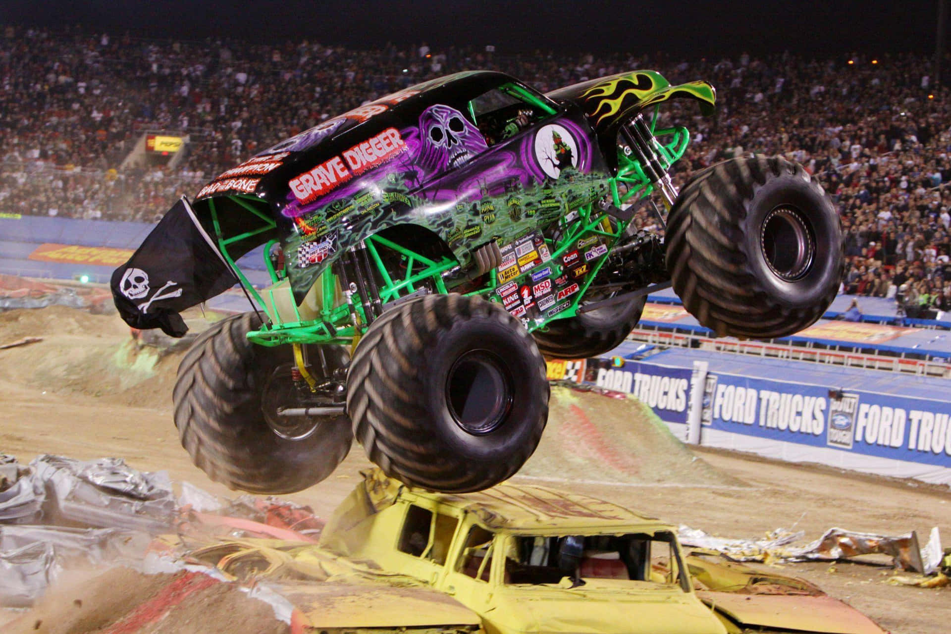 Grave Digger Monster Truck Going Upwards Background