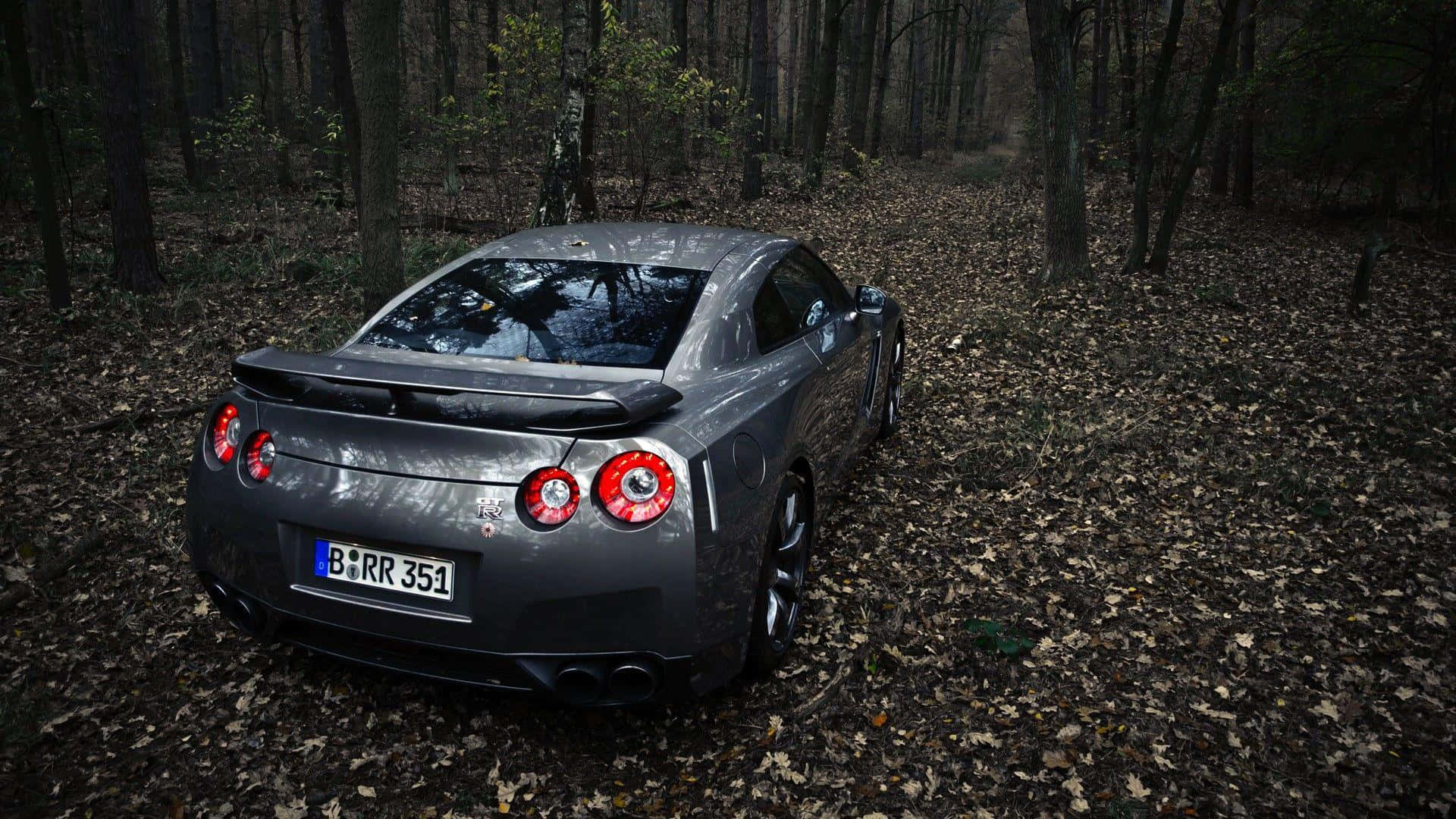 Gray Gt-r Desktop In The Woods Background