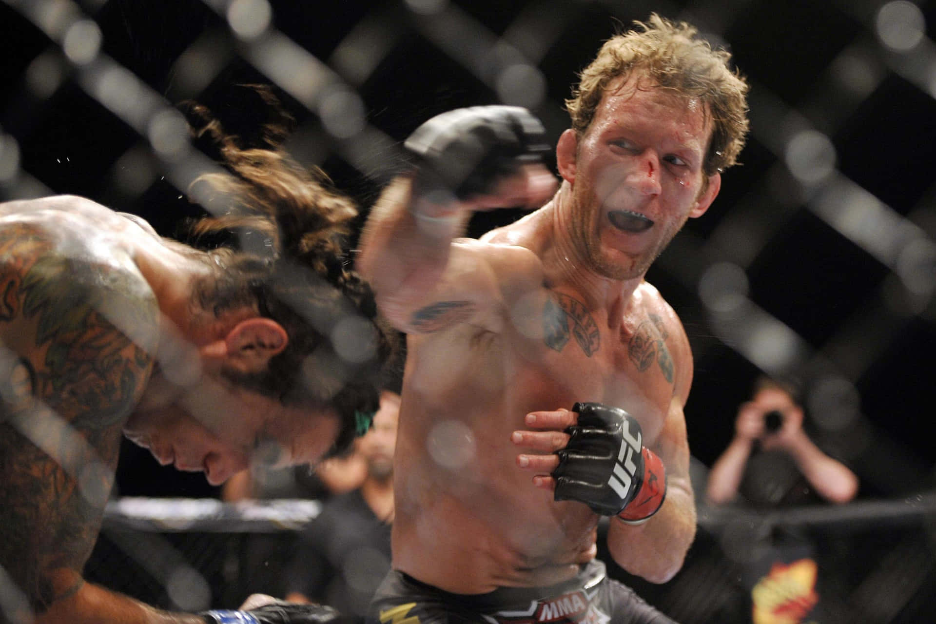 Gray Maynard Swinging His Fist Background