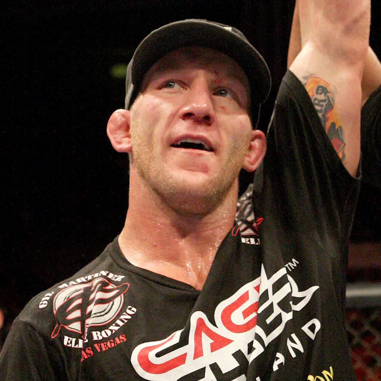 Gray Maynard With His Raised Arm Background