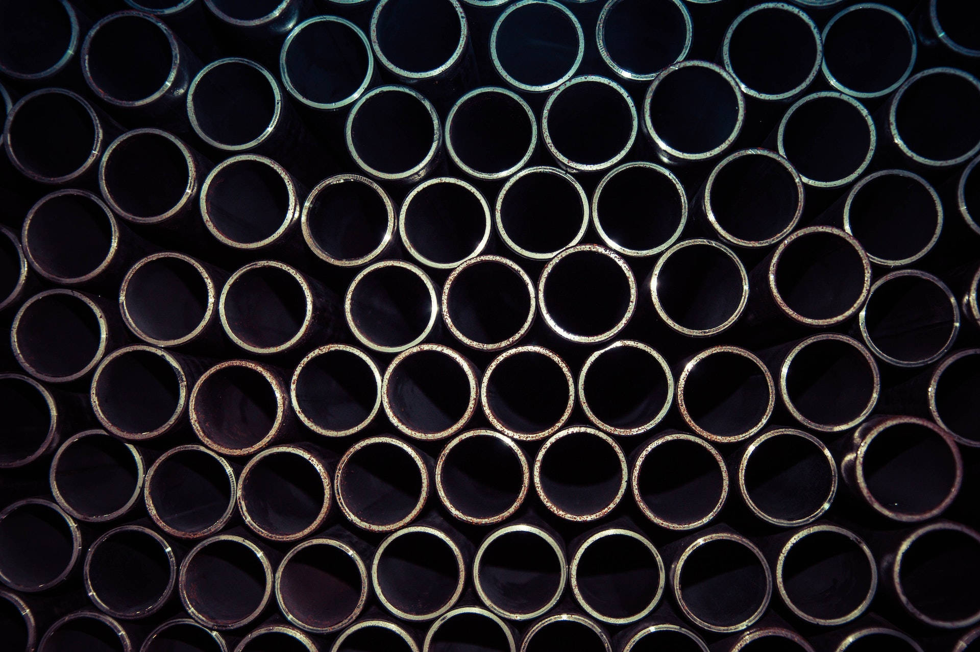 Gray Metal Pipes On Black Pc Background