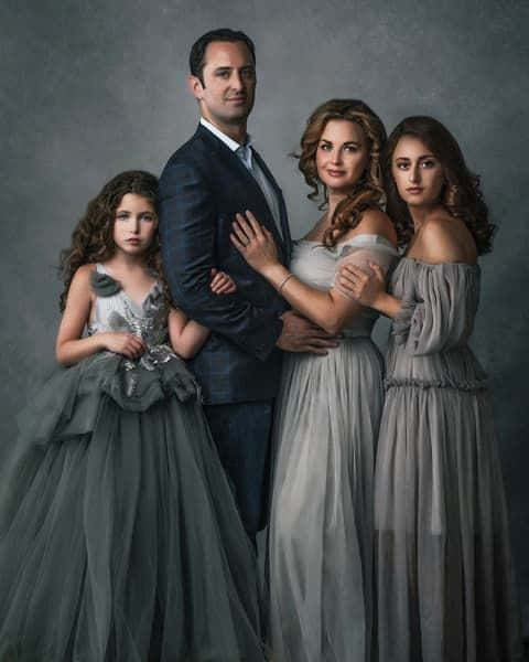 Gray Themed Family Portrait Of Four Background
