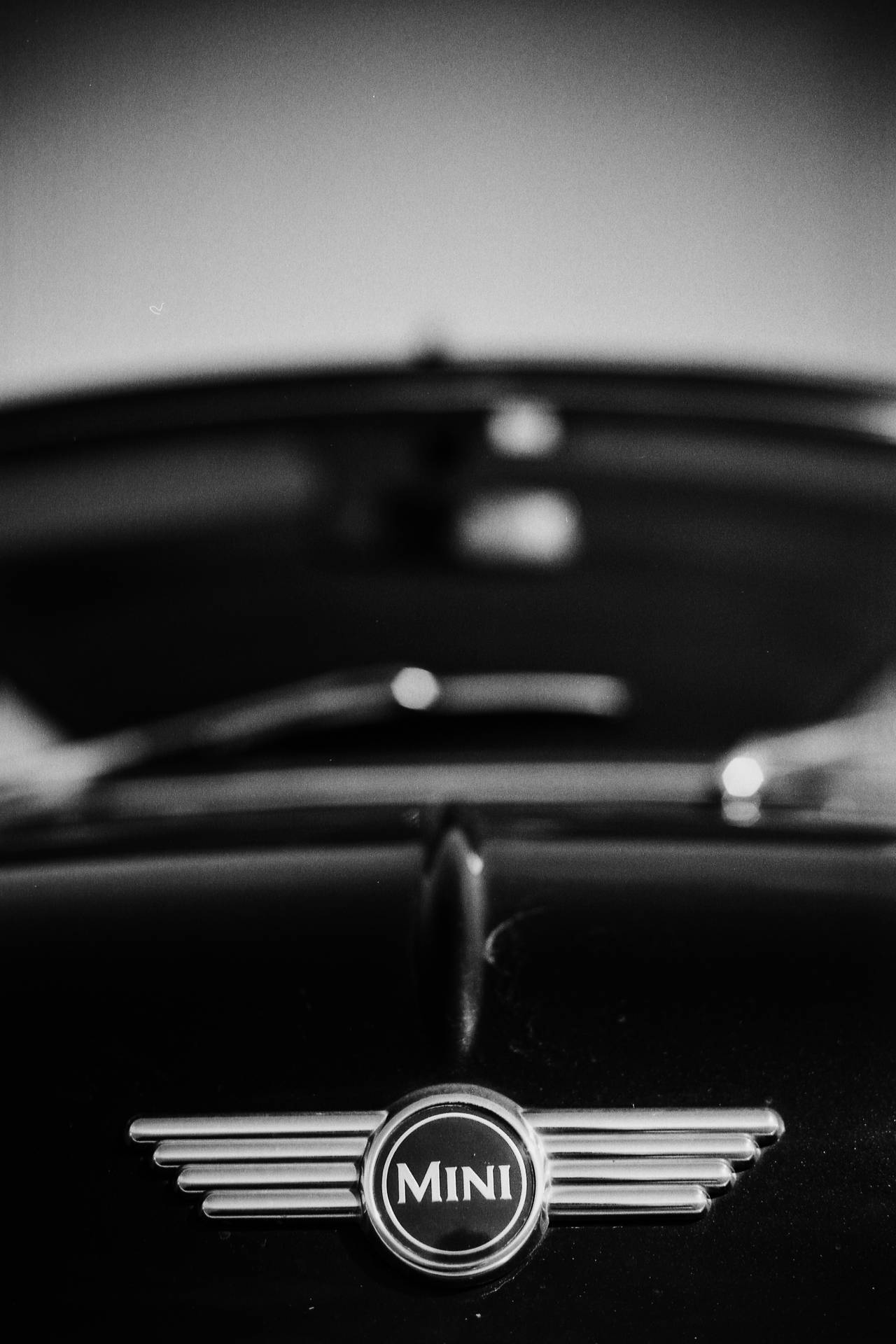 Grayscale Mini Cooper Logo Background